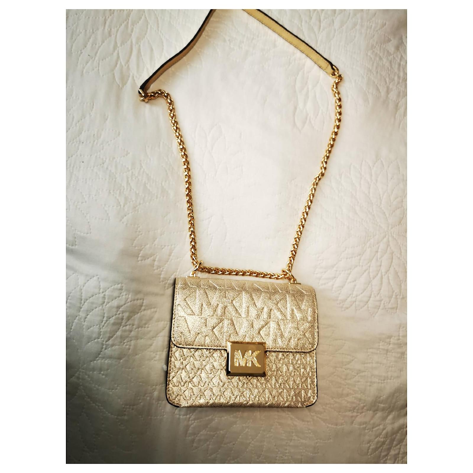 Pochette Michael Kors D'oro Pelle ref.473649 - Joli Closet