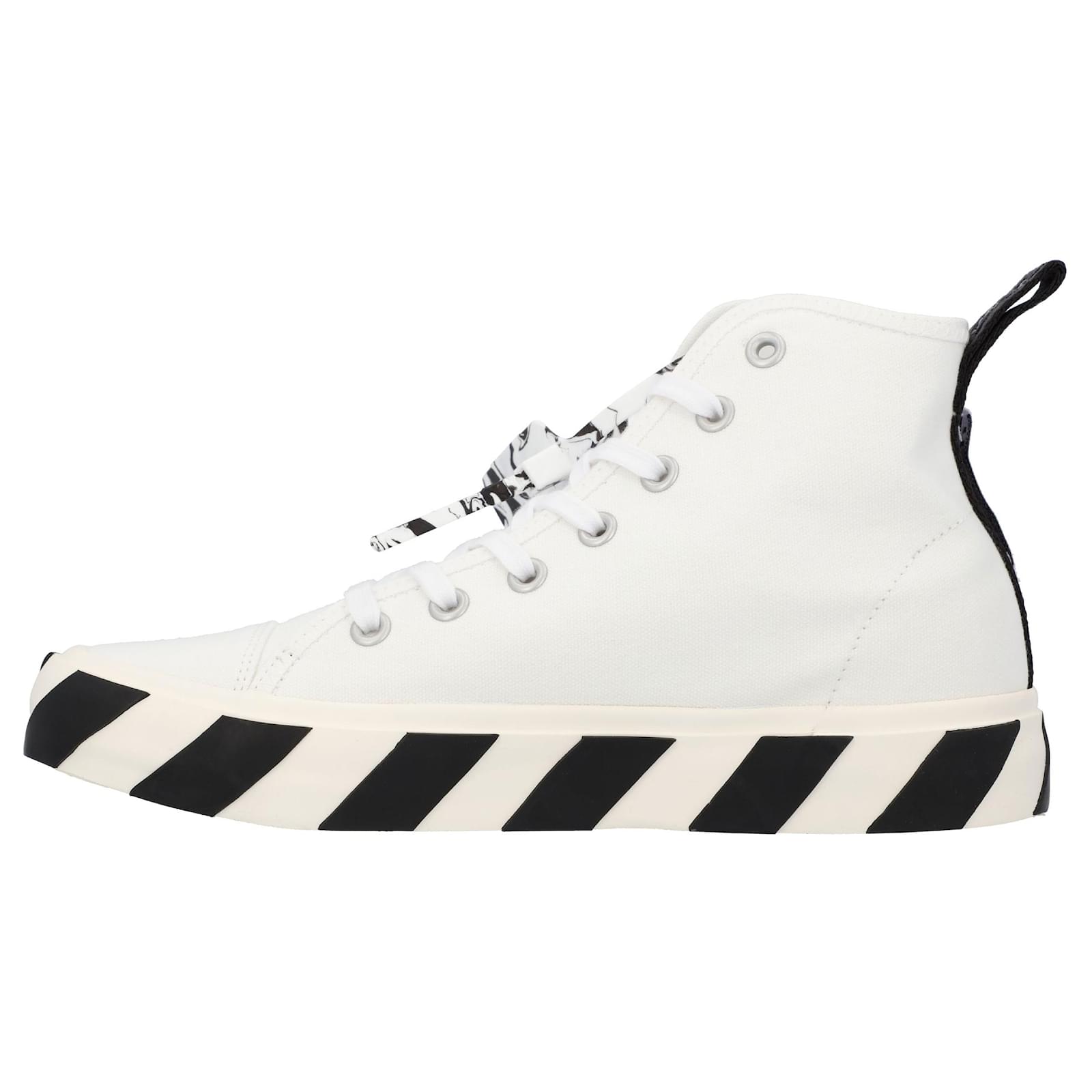 Off White Off-White Vulcanized mid-top sneakers Cotton ref.415526 ...