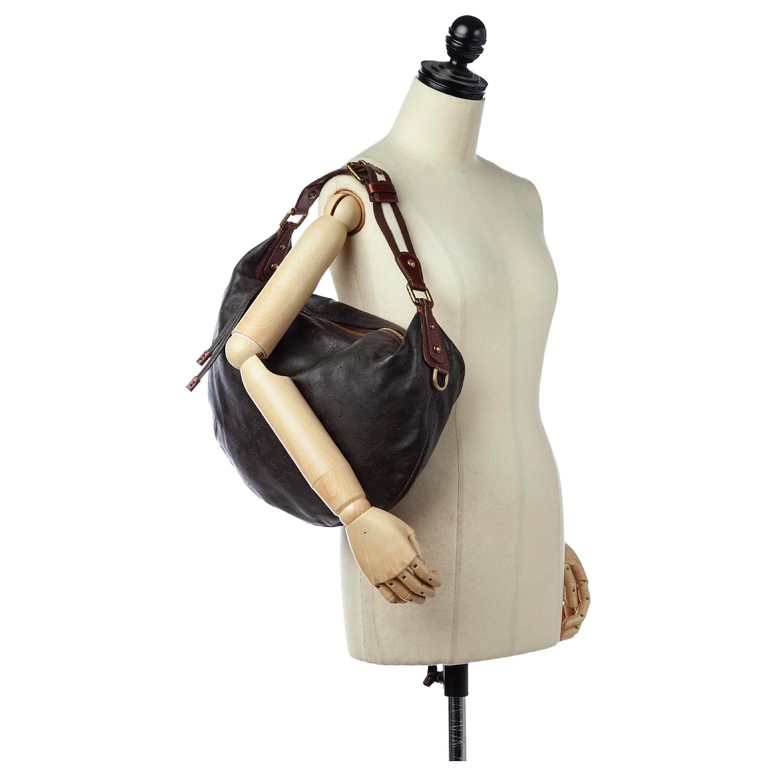 Louis Vuitton Brown Mahina Onatah GM Dark brown Leather Pony-style calfskin  ref.419025 - Joli Closet