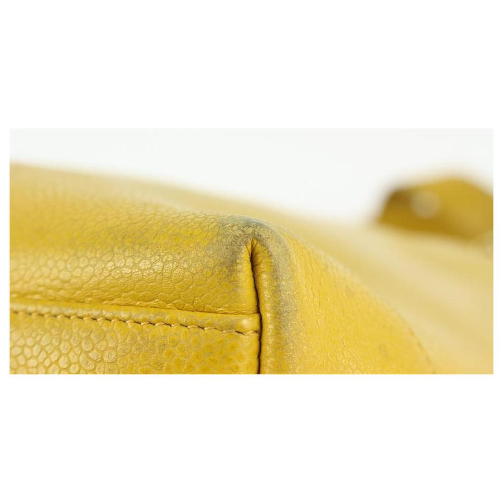 Versace Yellow Leather Mini Medusa Empire ToteThis alluring tote
