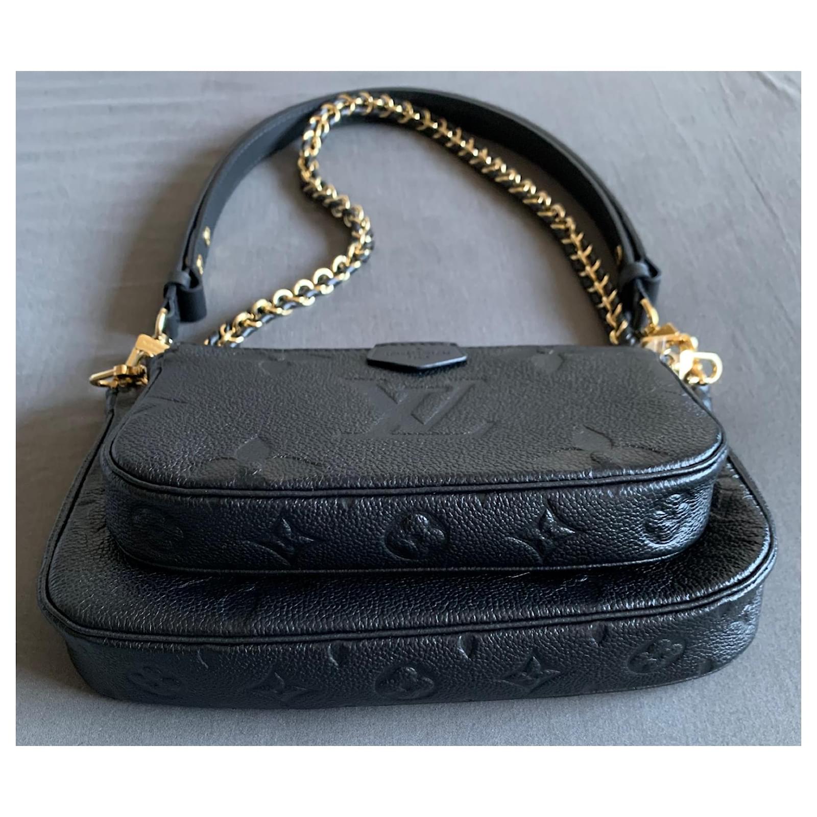 Louis Vuitton Bolsa de accesorios Multi Pochette Negro Cuero ref.767322 -  Joli Closet