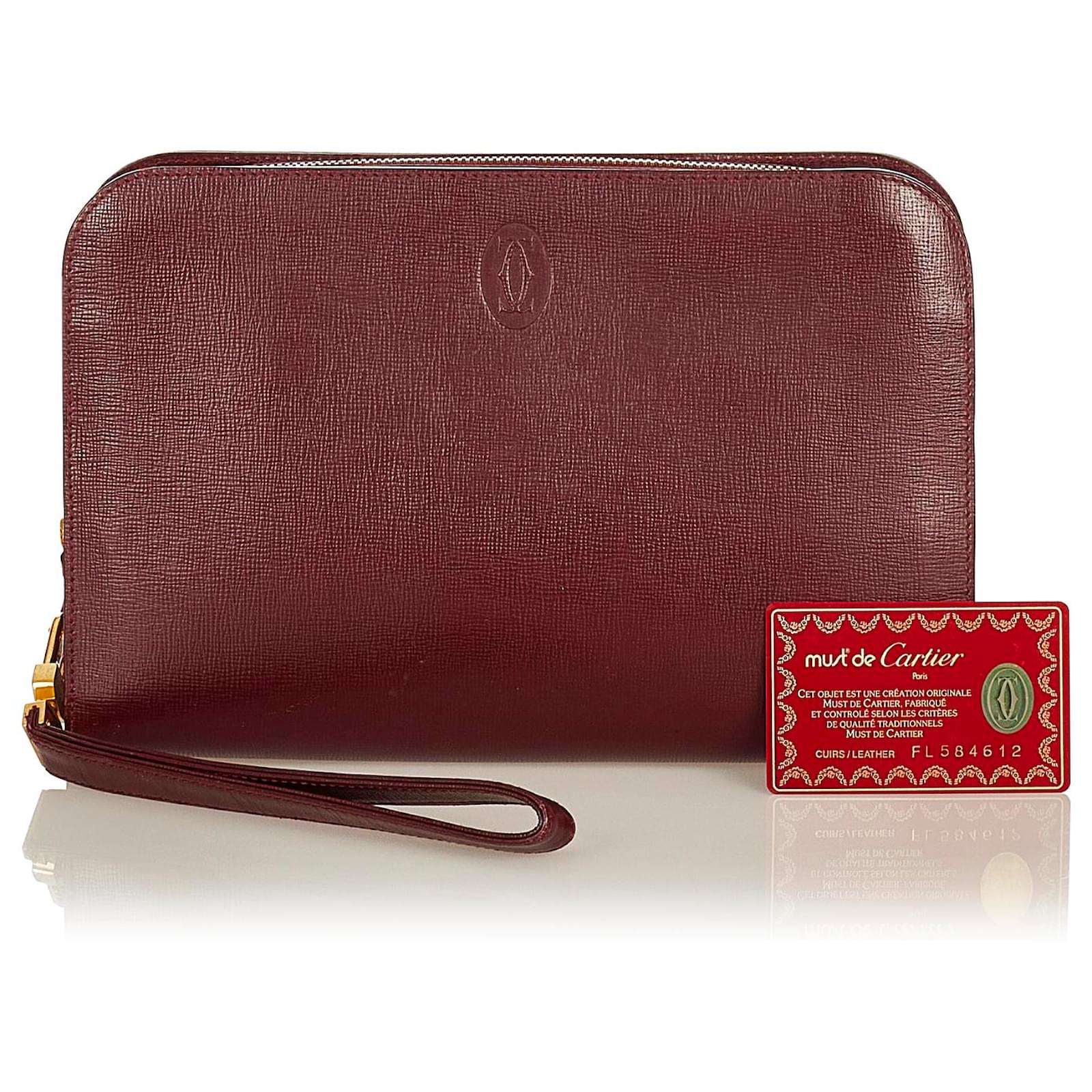 dark red clutch bag