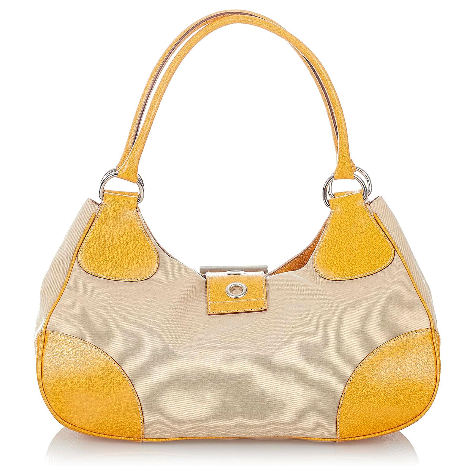 Prada Brown Canvas Shoulder Bag Beige Yellow Leather Cloth Pony-style  calfskin Cloth ref.422416 - Joli Closet