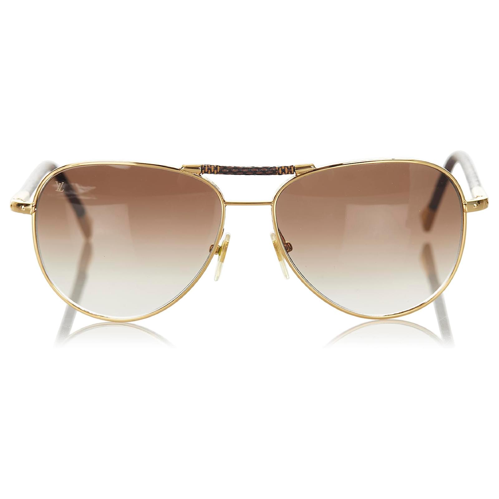 Louis Vuitton Black Conspiration Pilot Sunglasses Golden Metal Plastic  ref.426763 - Joli Closet