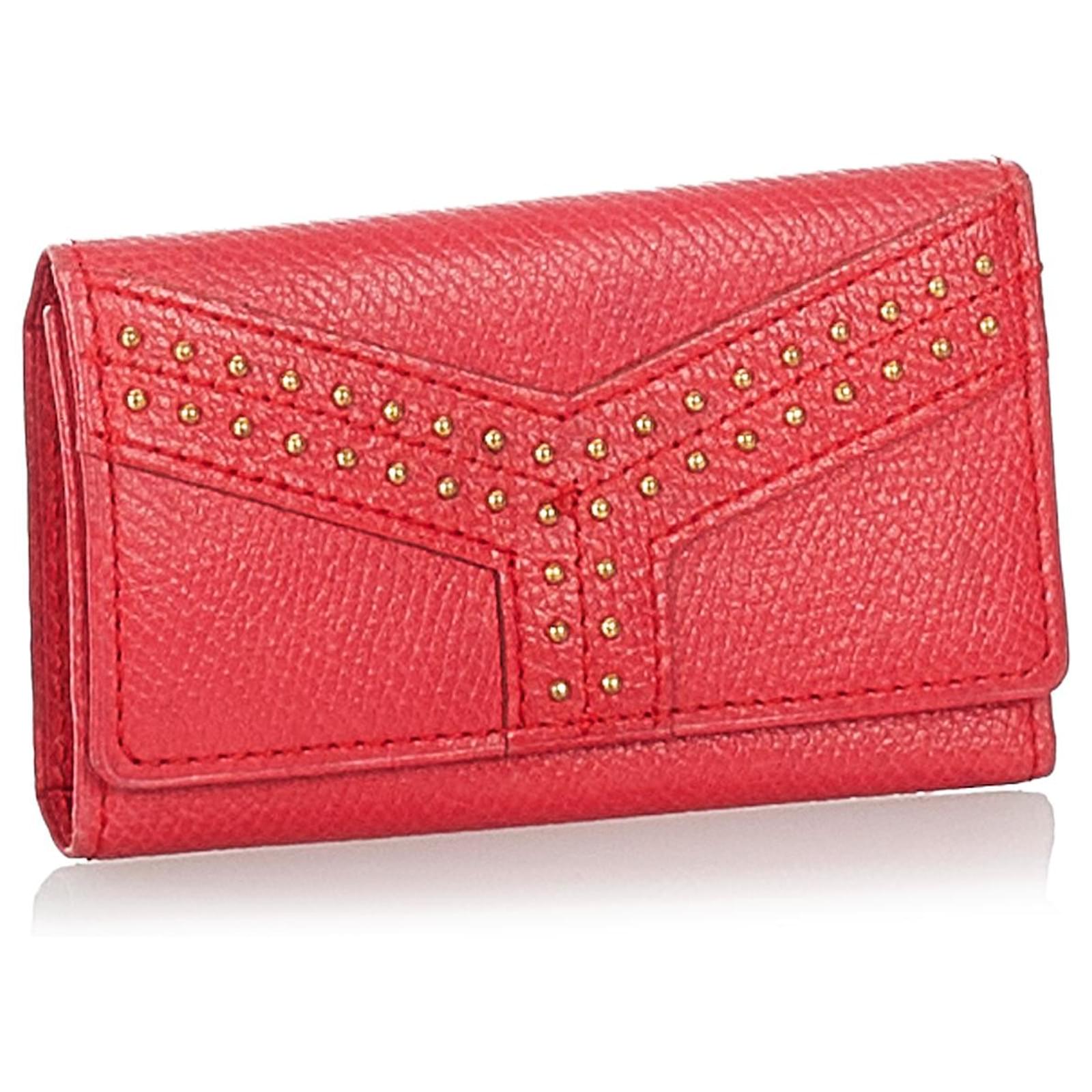 Yves Saint Laurent YSL Red Studded Leather Key Holder Pony-style calfskin  ref.428168 - Joli Closet