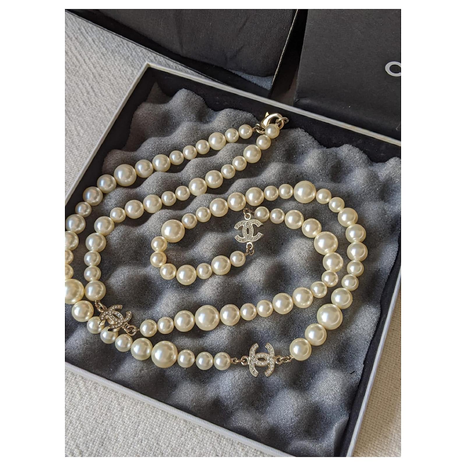 Chanel Classic Long Pearl Necklace with 5 CC Silver Crystal Logos