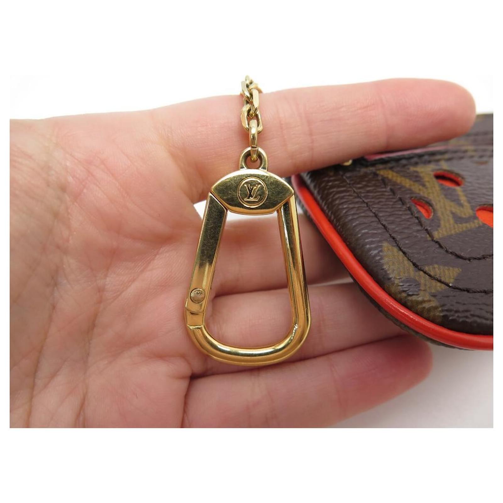 LOUIS VUITTON KEY POUCH IN ORANGE PERFORATED MONOGRAM CANVAS KEY RING POUCH  Brown Cloth ref.444456 - Joli Closet