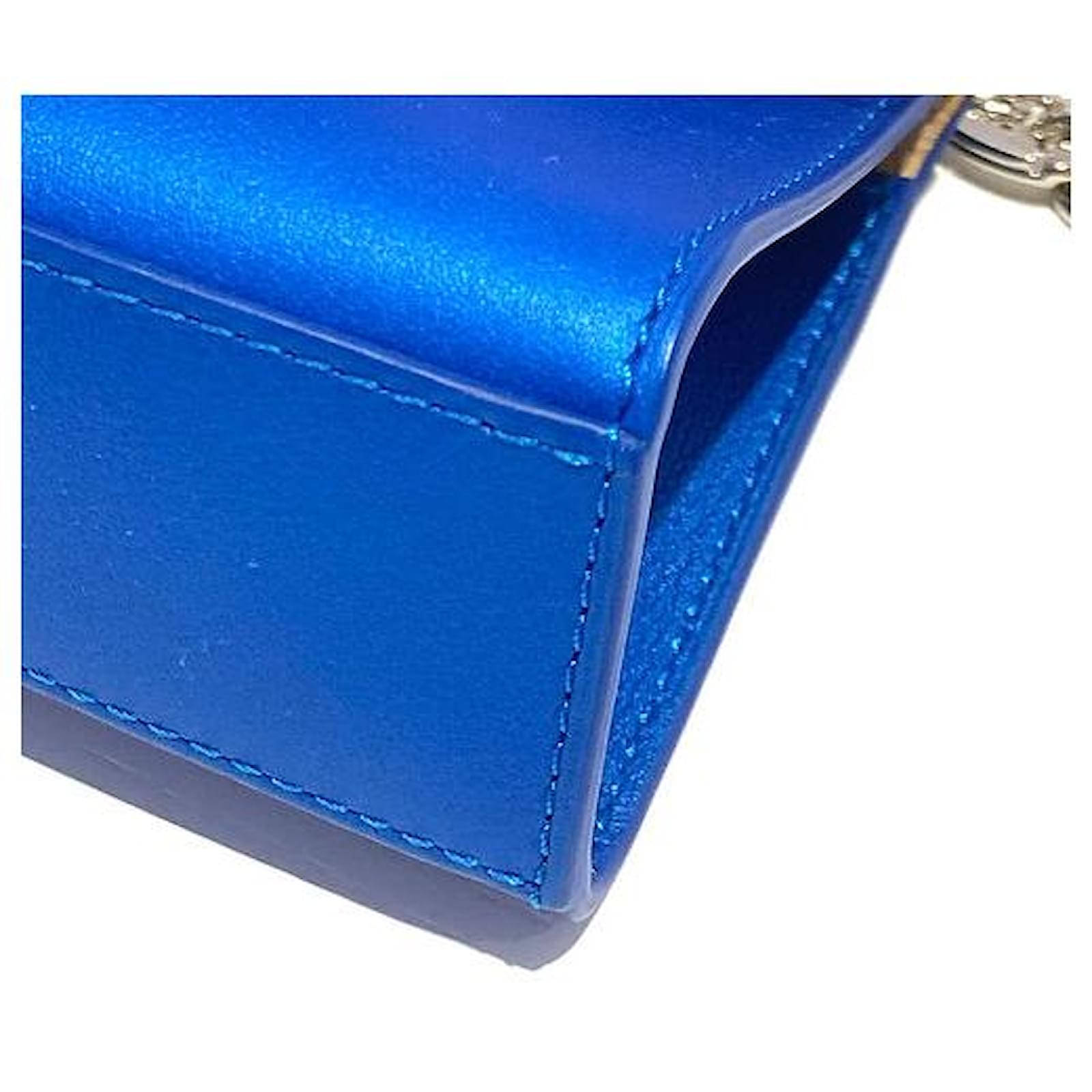 Delvaux Mini Brillant Bag Charm with Fur Blue Metallic Leather ref