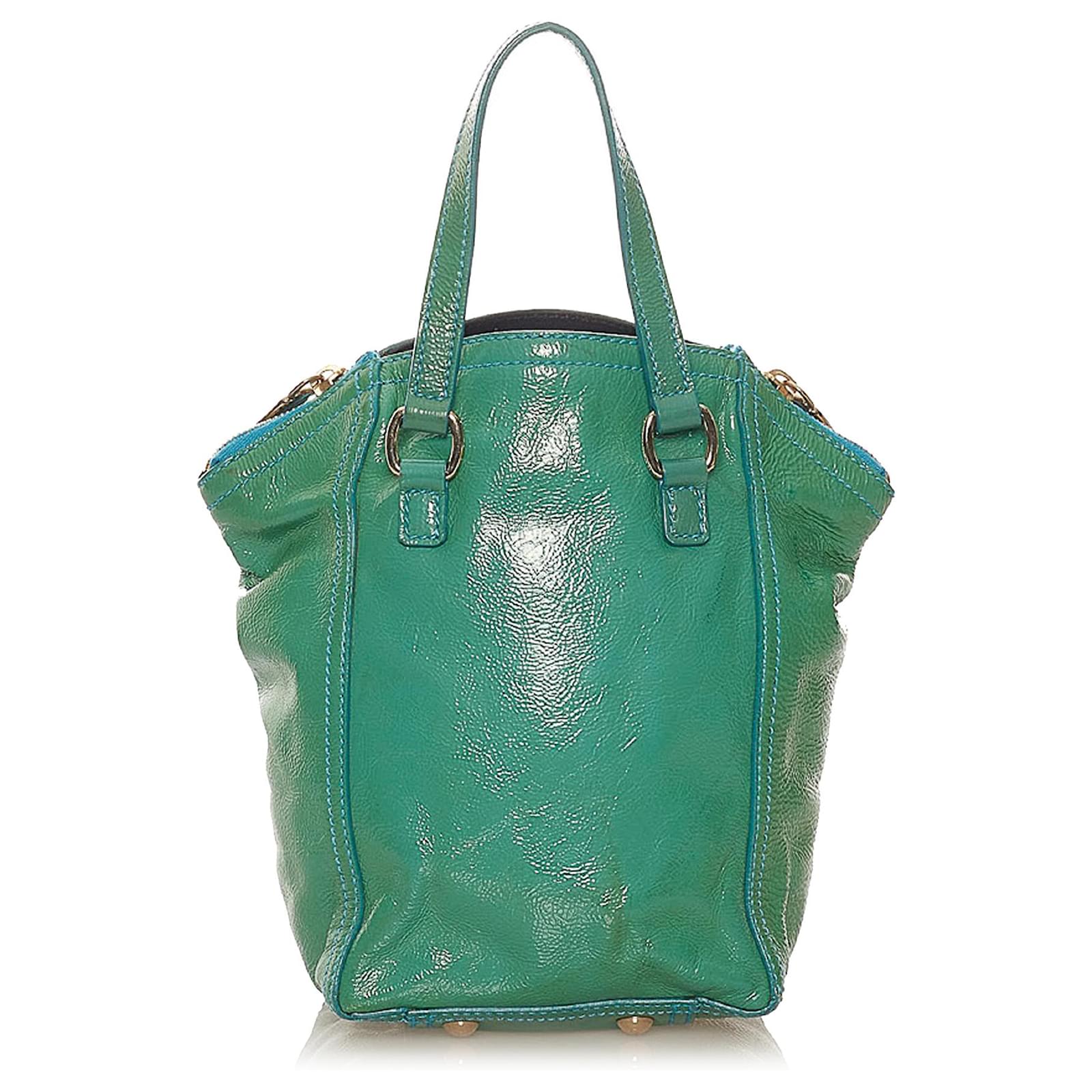 green patent leather purse