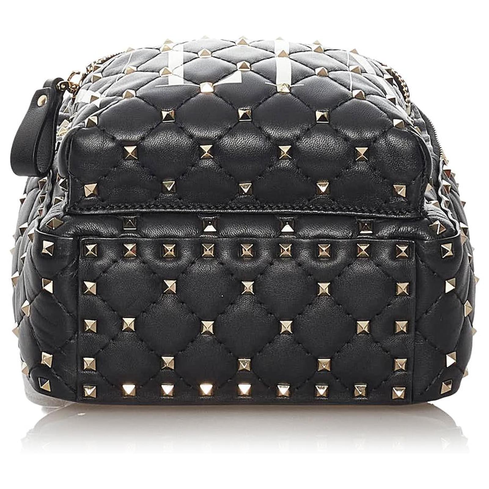 Valentino Black Rockstud Spike VLTN Leather Backpack White Metal Pony-style  calfskin ref.457423 - Joli Closet