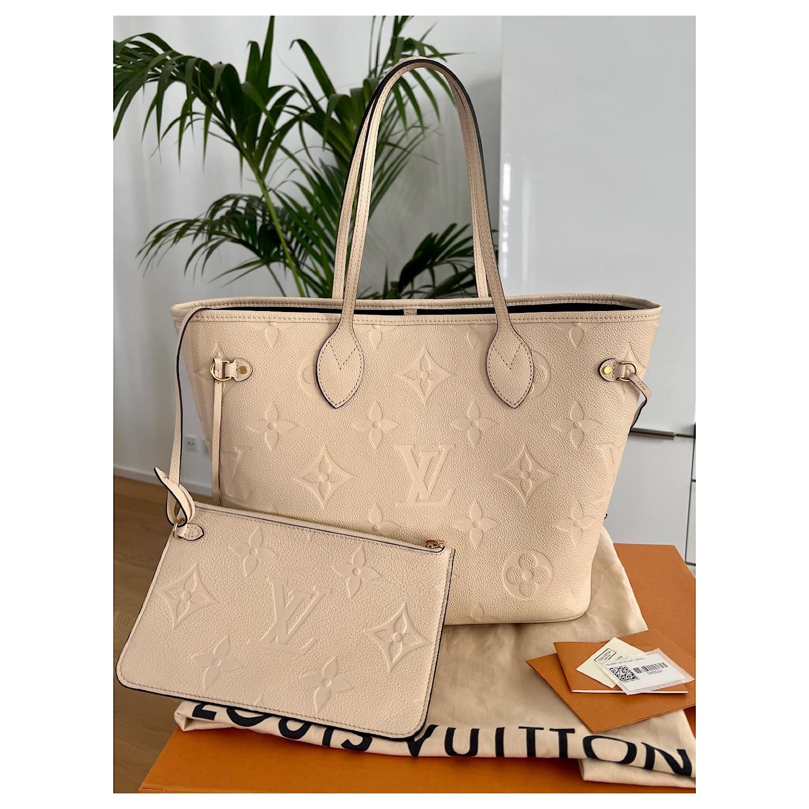 Louis Vuitton Neverfull MM Empreinte Creme with Pouch Cream Leather  ref.464484 - Joli Closet