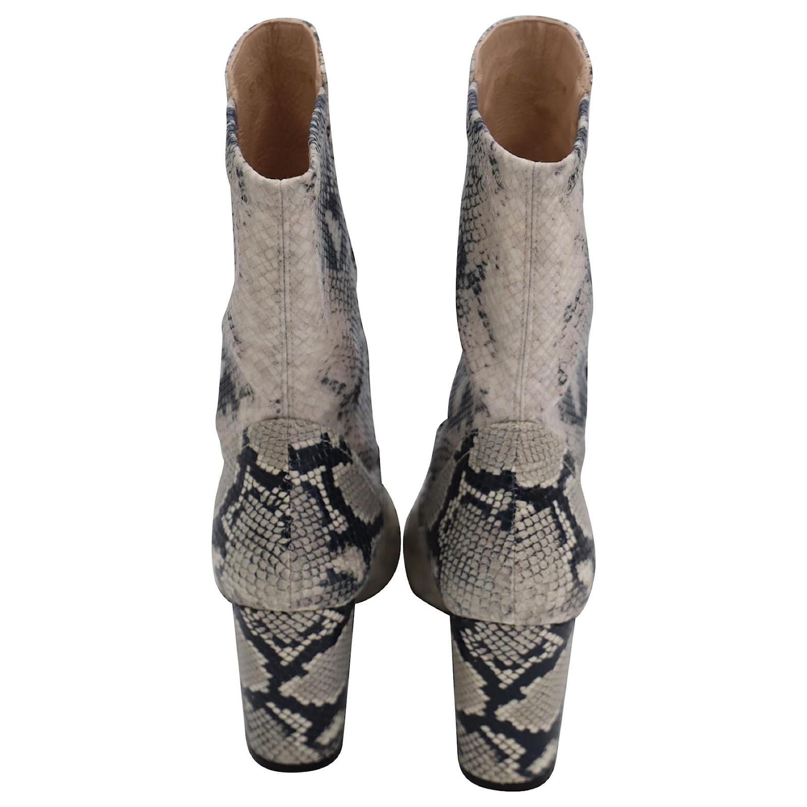 stuart weitzman snake print boots