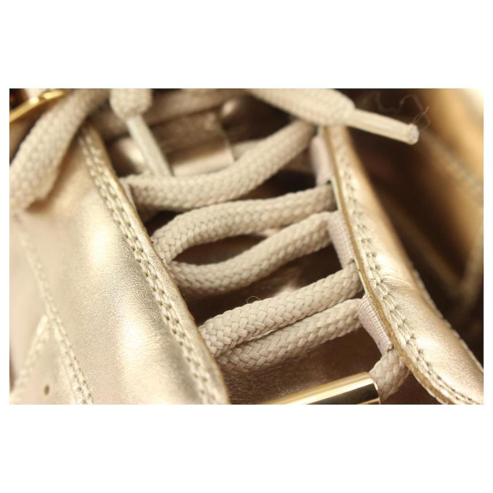 Louis Vuitton Size 36 Gold Metallic High Top Sneaker White gold ref.466398  - Joli Closet