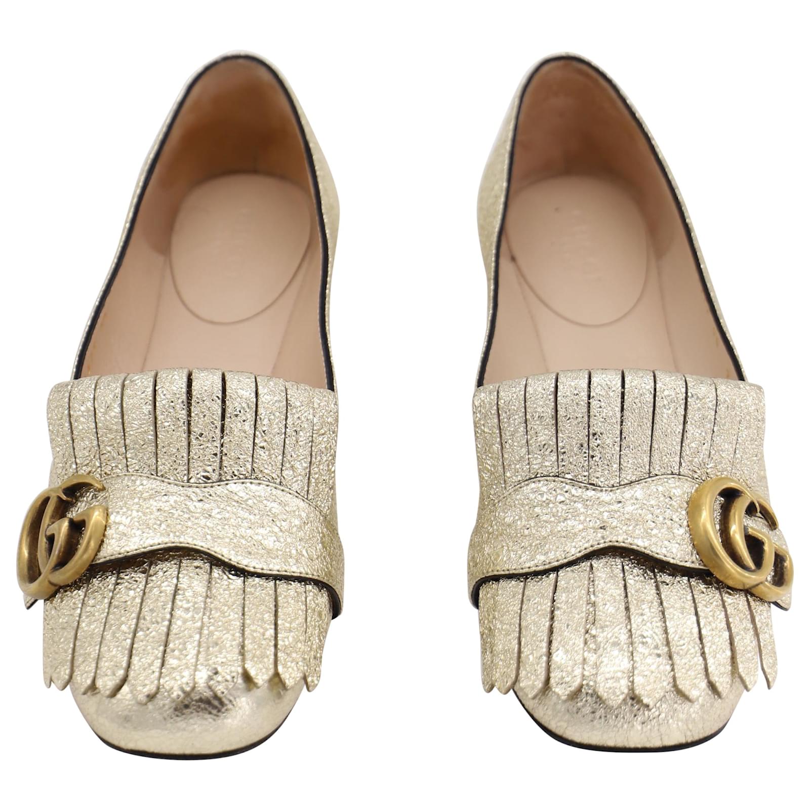 Gucci Zapatos planos con flecos GG laminados dorados Marmont de piel de  becerro dorada Cuero ref.469317 - Joli Closet