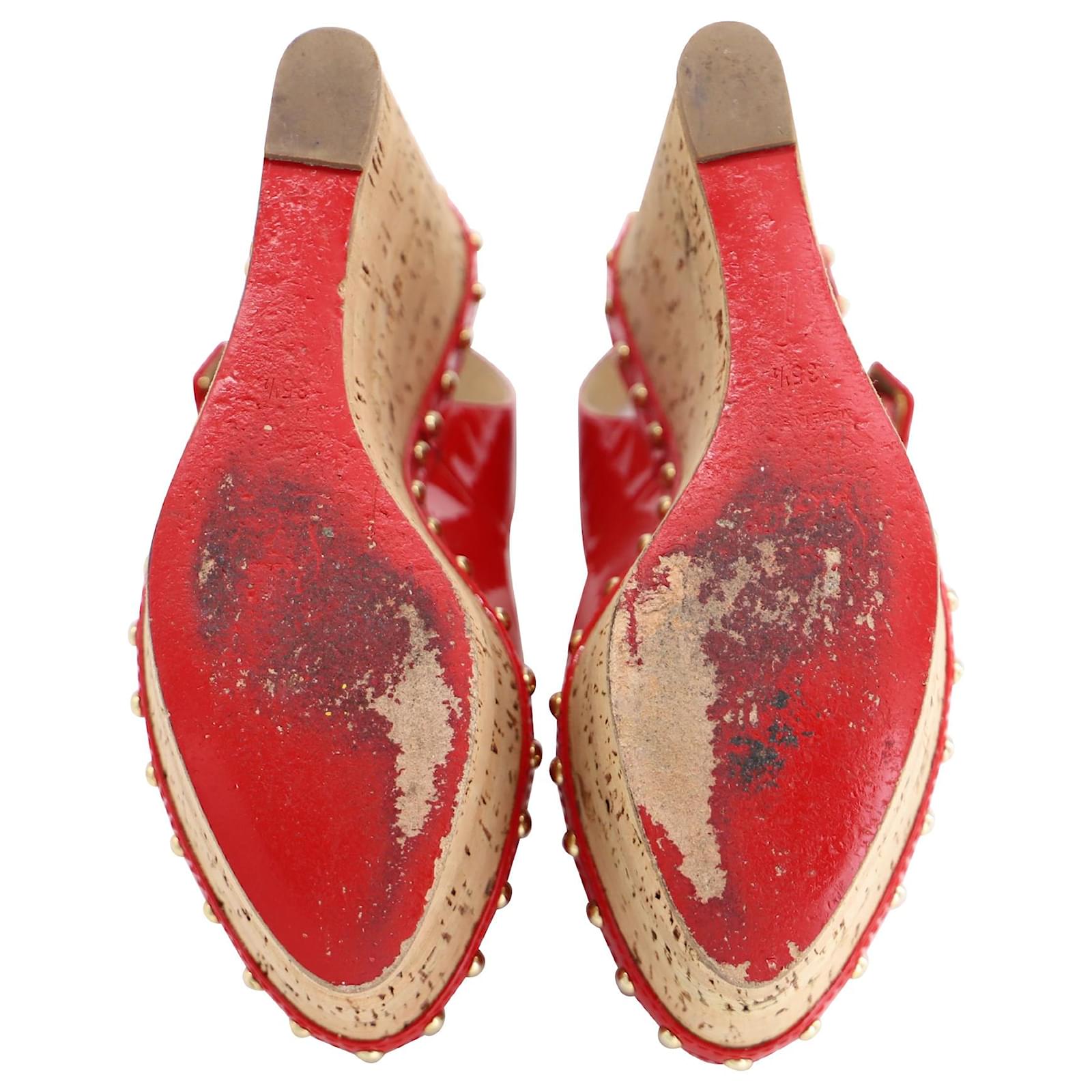 Christian Louboutin Cork Wedges with Gold Studs in Red Leather Patent  leather ref.471352 - Joli Closet