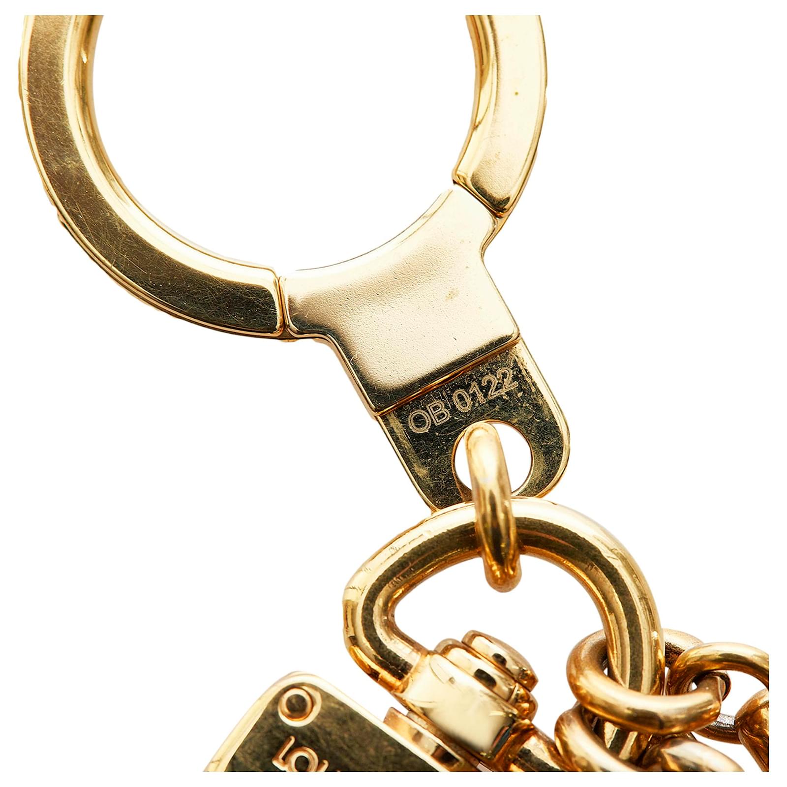 Louis Vuitton Gold Lock and Key Bag Charm Golden Metal ref.473435 - Joli  Closet