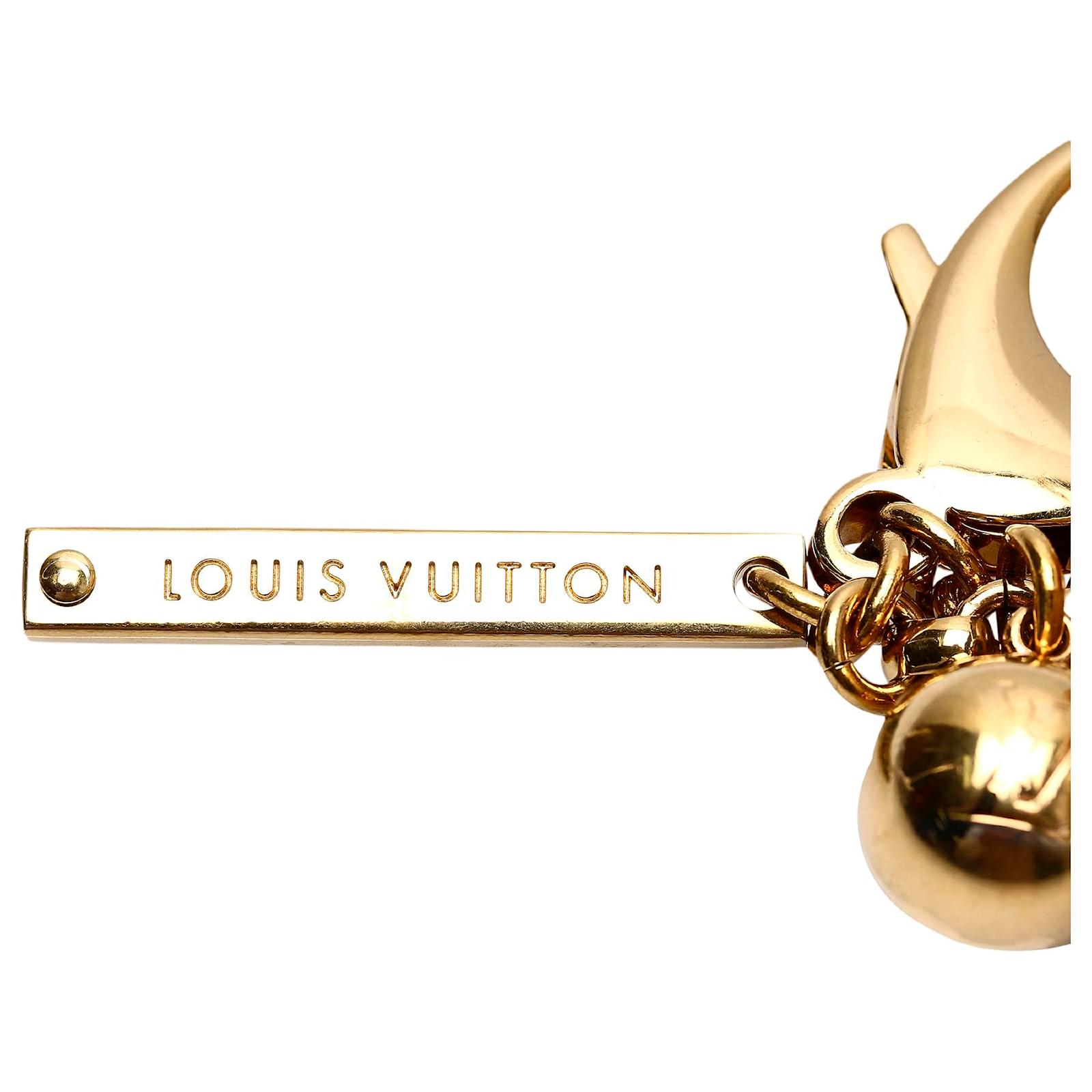 Louis Vuitton Brown Resin Ball Bag Charm Golden Metal Plastic ref.475565 -  Joli Closet
