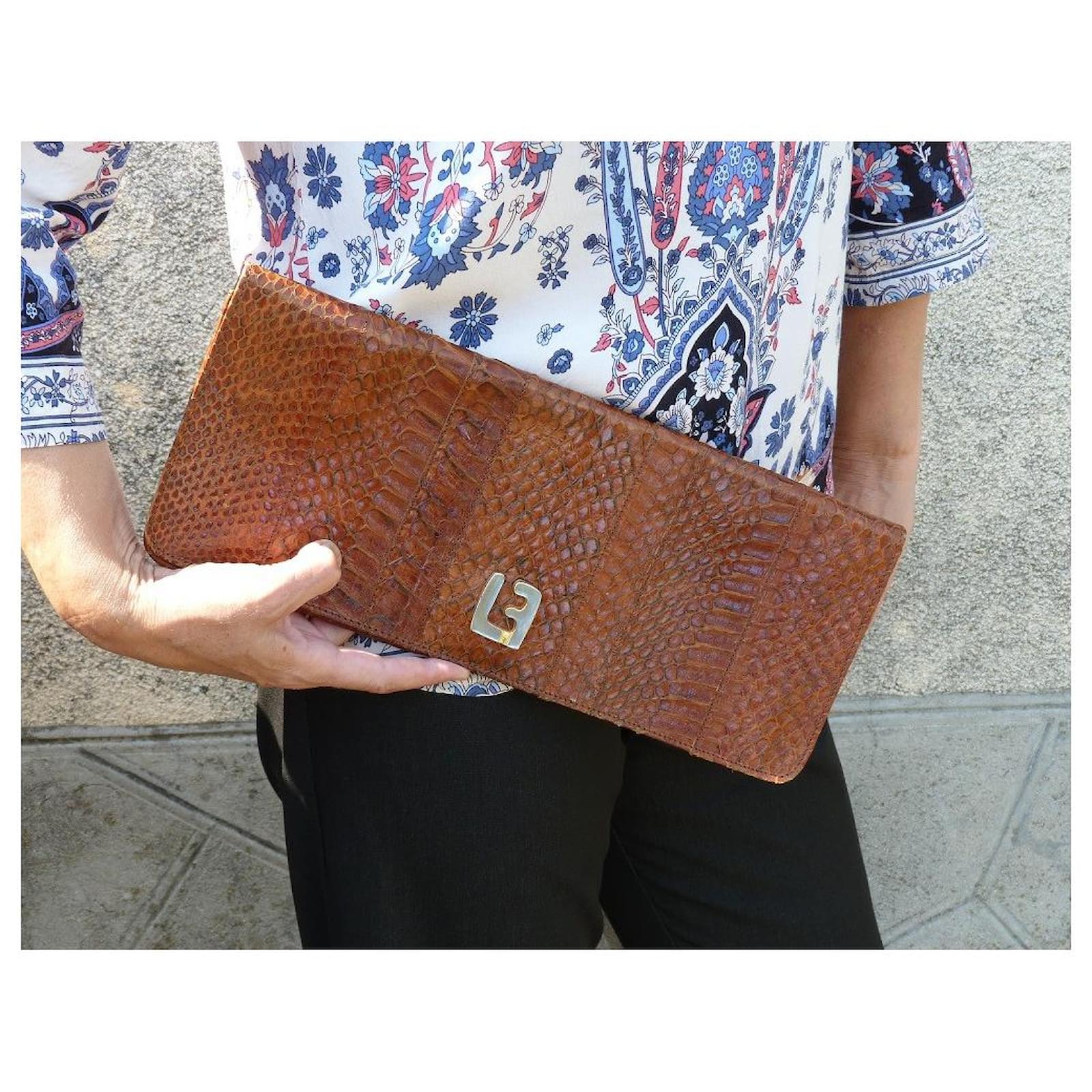 Louis Féraud Clutch bags Brown Exotic leather ref.486902 - Joli Closet