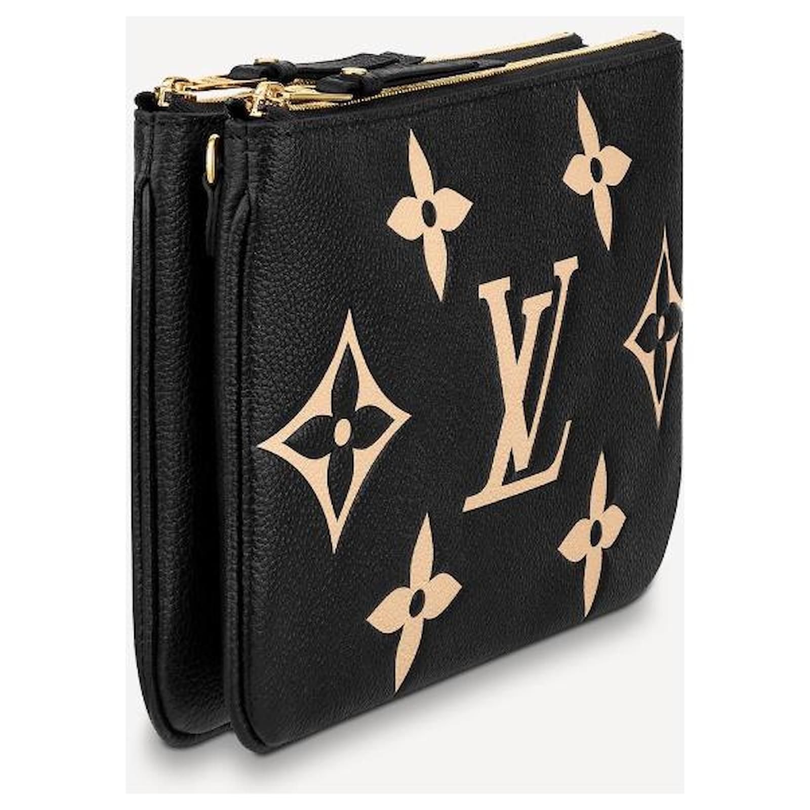 Louis Vuitton LV lined zip pochette empreinte Black Leather ref.488252 -  Joli Closet