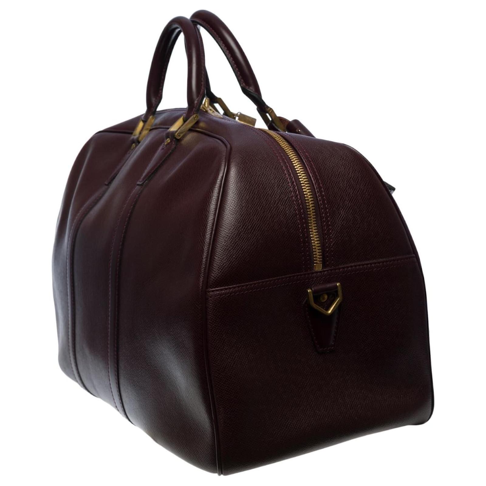 Very beautiful Louis Vuitton Kendall travel bag in burgundy taiga  leather, garniture en métal doré Dark red ref.487847 - Joli Closet