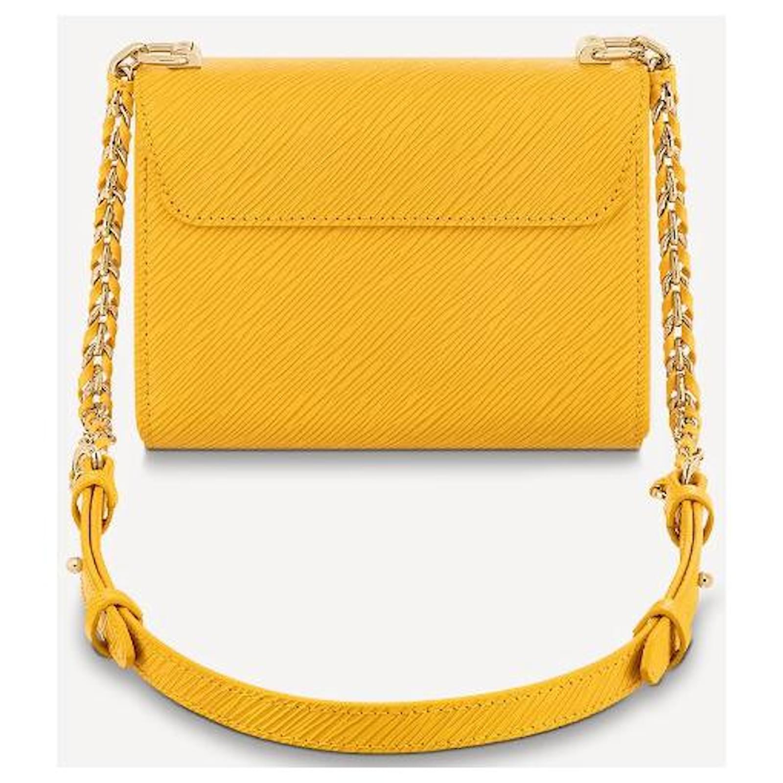 Leather small bag Louis Vuitton Yellow in Leather - 25207531