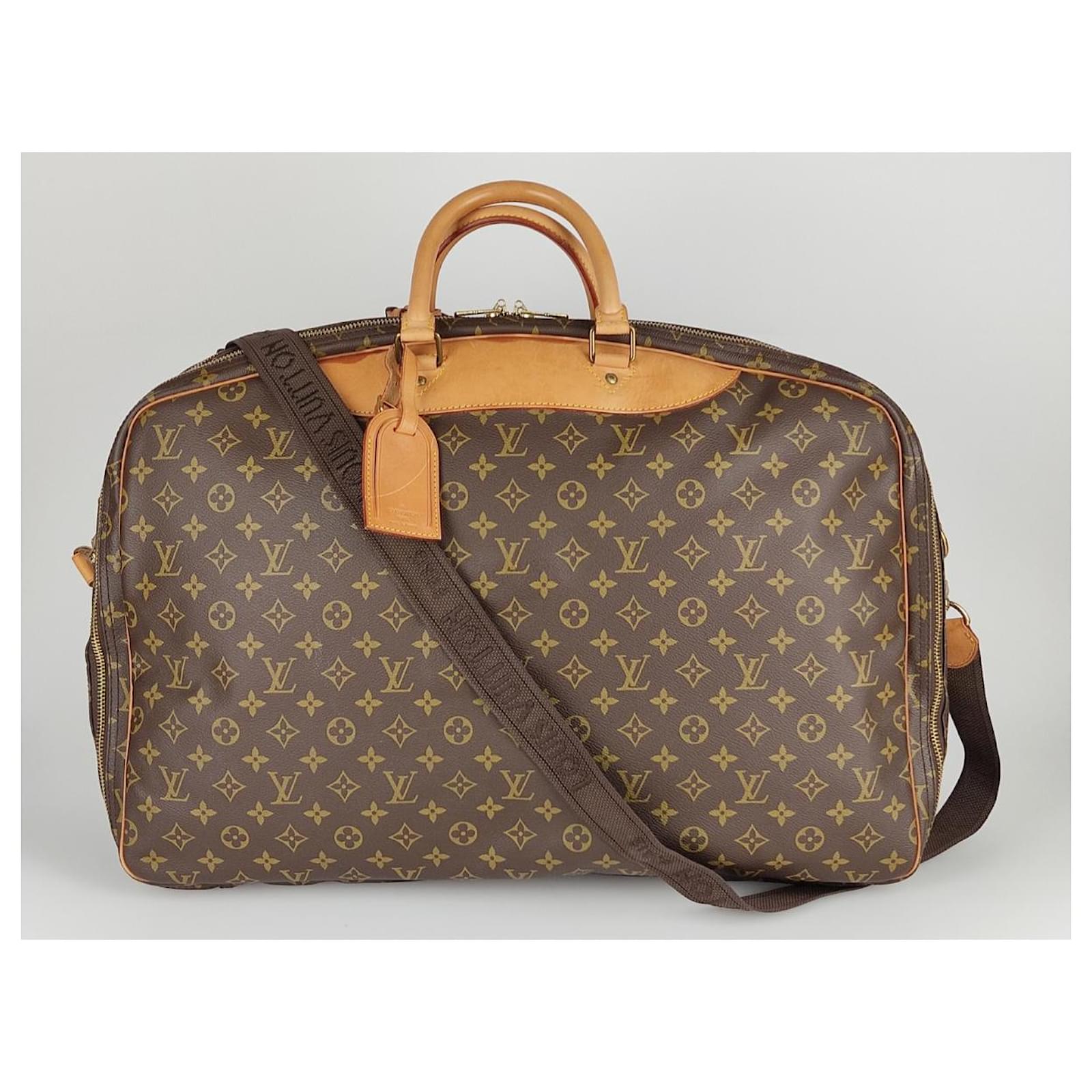 Louis Vuitton Alize 2 Poches Travel Bag.