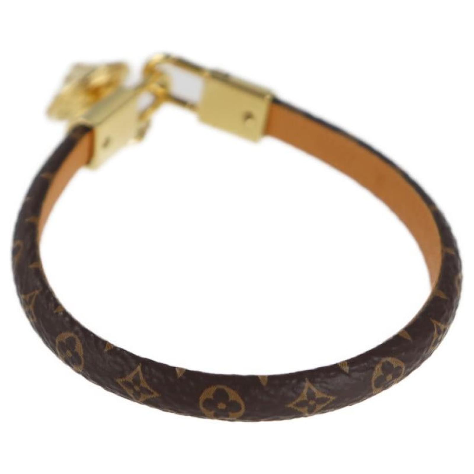 Used] LOUIS VUITTON Brasle Topi Monogram M6567E Bracelet PVC Leather Metal  Brown Gold Golden ref.497439 - Joli Closet
