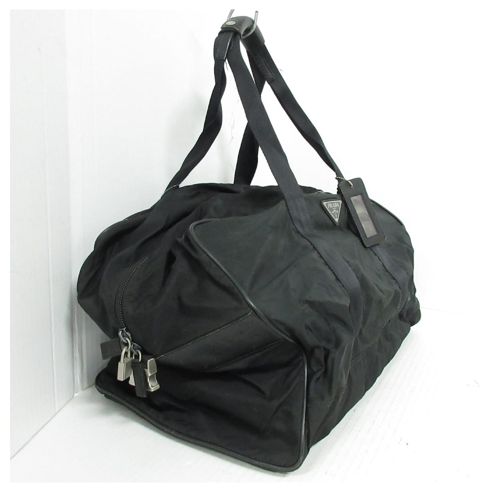 PRADA TRAVEL BAG Black Synthetic ref.498277 - Joli Closet