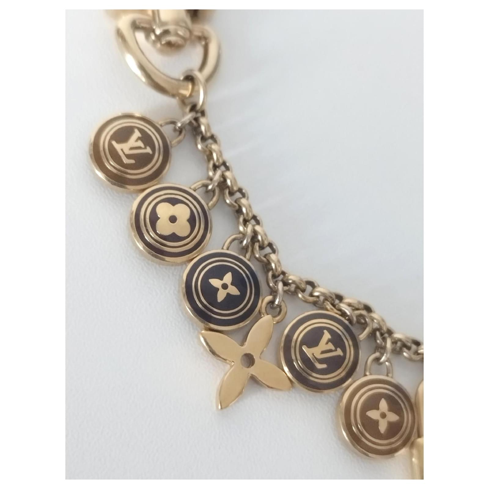 Louis Vuitton Breloques Brown Bag Charm Golden Metal ref.508985 - Joli  Closet