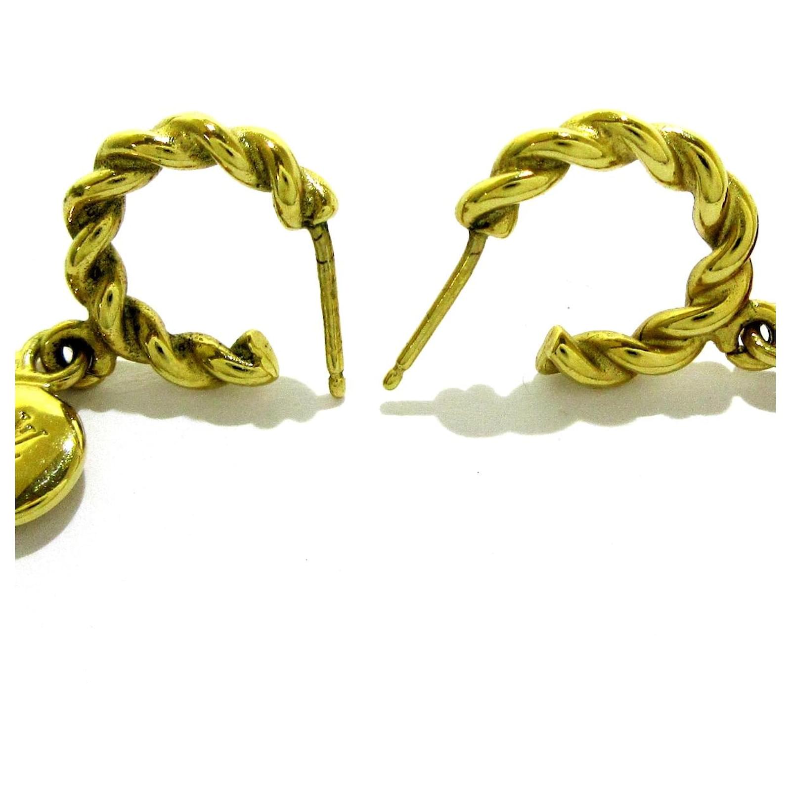 boucle d'oreille louis vuitton homme