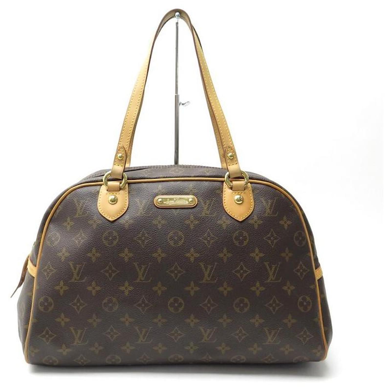 LOUIS VUITTON MONTORGUEIL GM M HANDBAG95566 IN MONOGRAM HAND BAG CANVAS  Brown Leather ref.517684 - Joli Closet