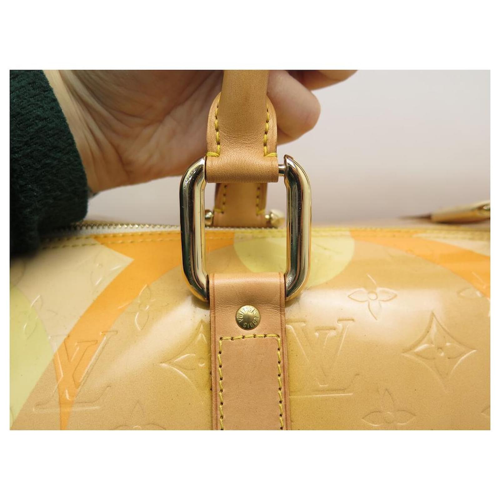 Keepall patent leather travel bag Louis Vuitton Yellow in Patent leather -  33680770