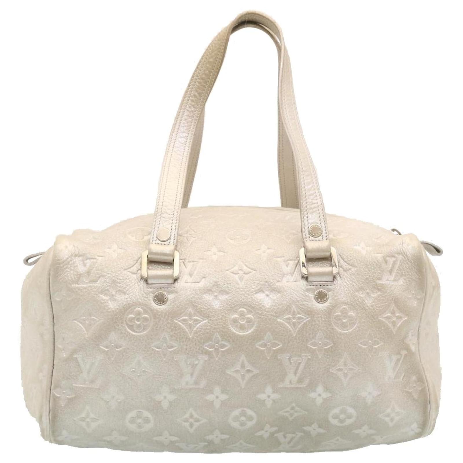 Louis Vuitton Shimmer Peach Monogram Comete Bag – The Closet