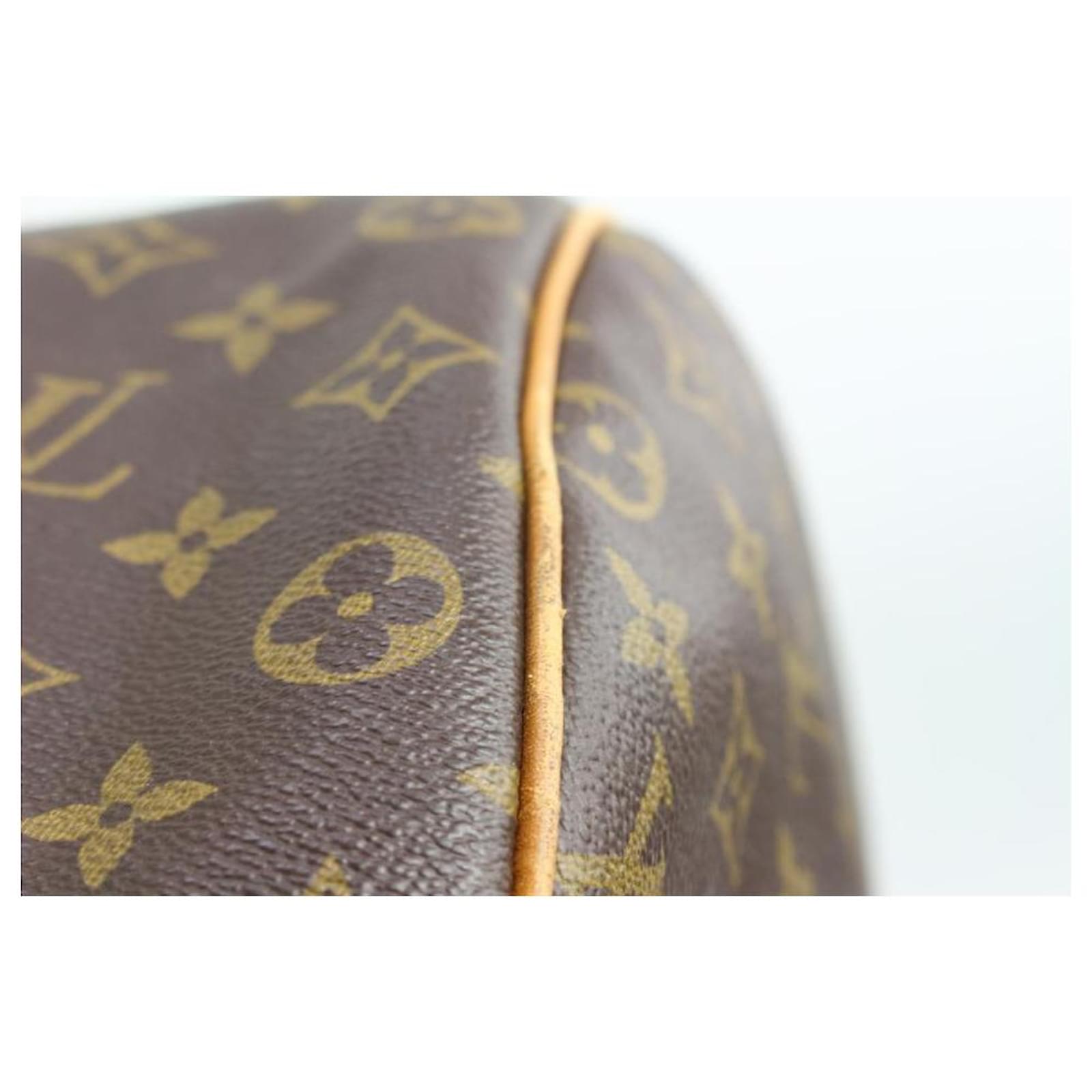 Louis Vuitton Monogram Sac Polochon 70 Keepall Bandouliere 24lv216s