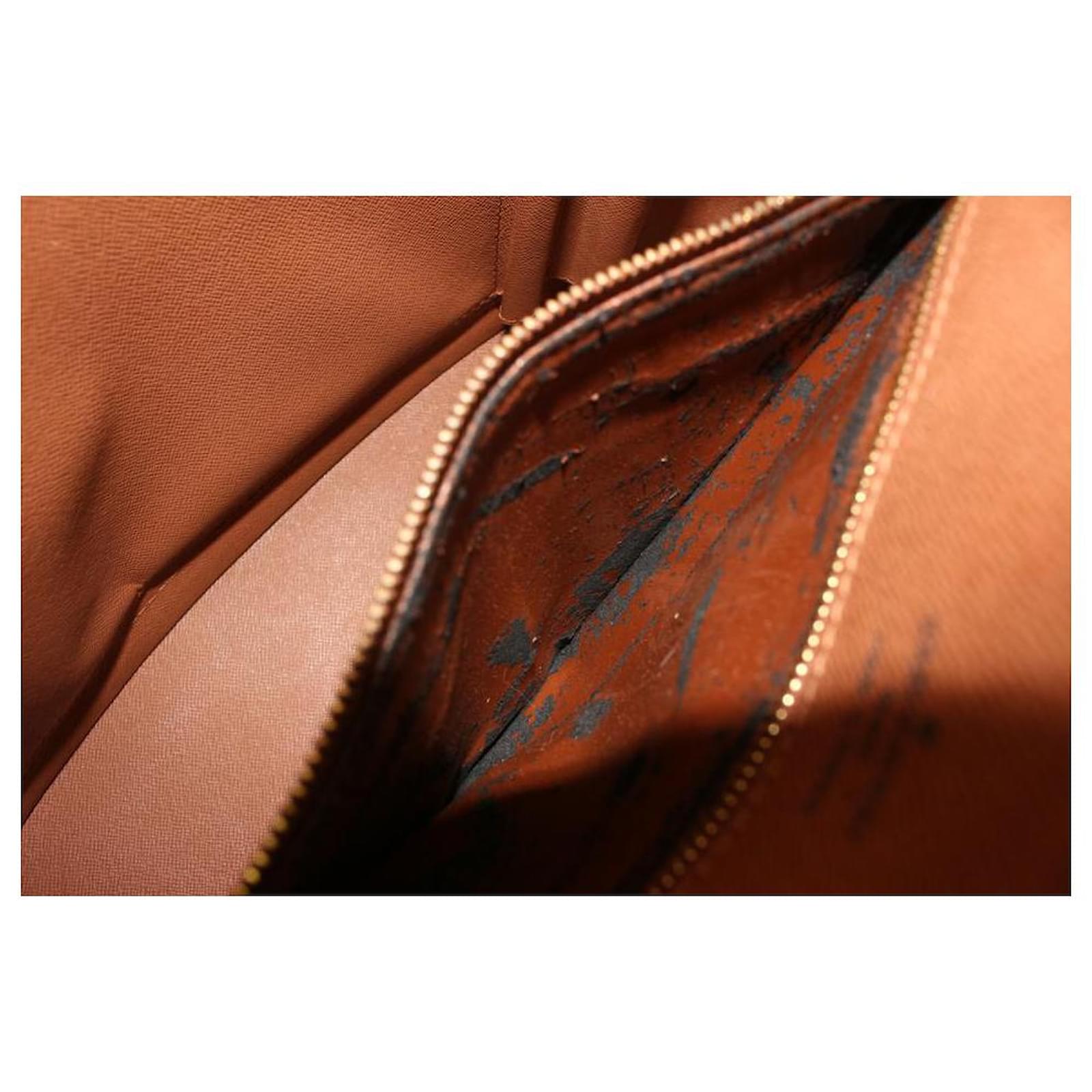 Louis Vuitton Sac cabas zippé à monogramme Babylone Cuir ref.539459 - Joli  Closet