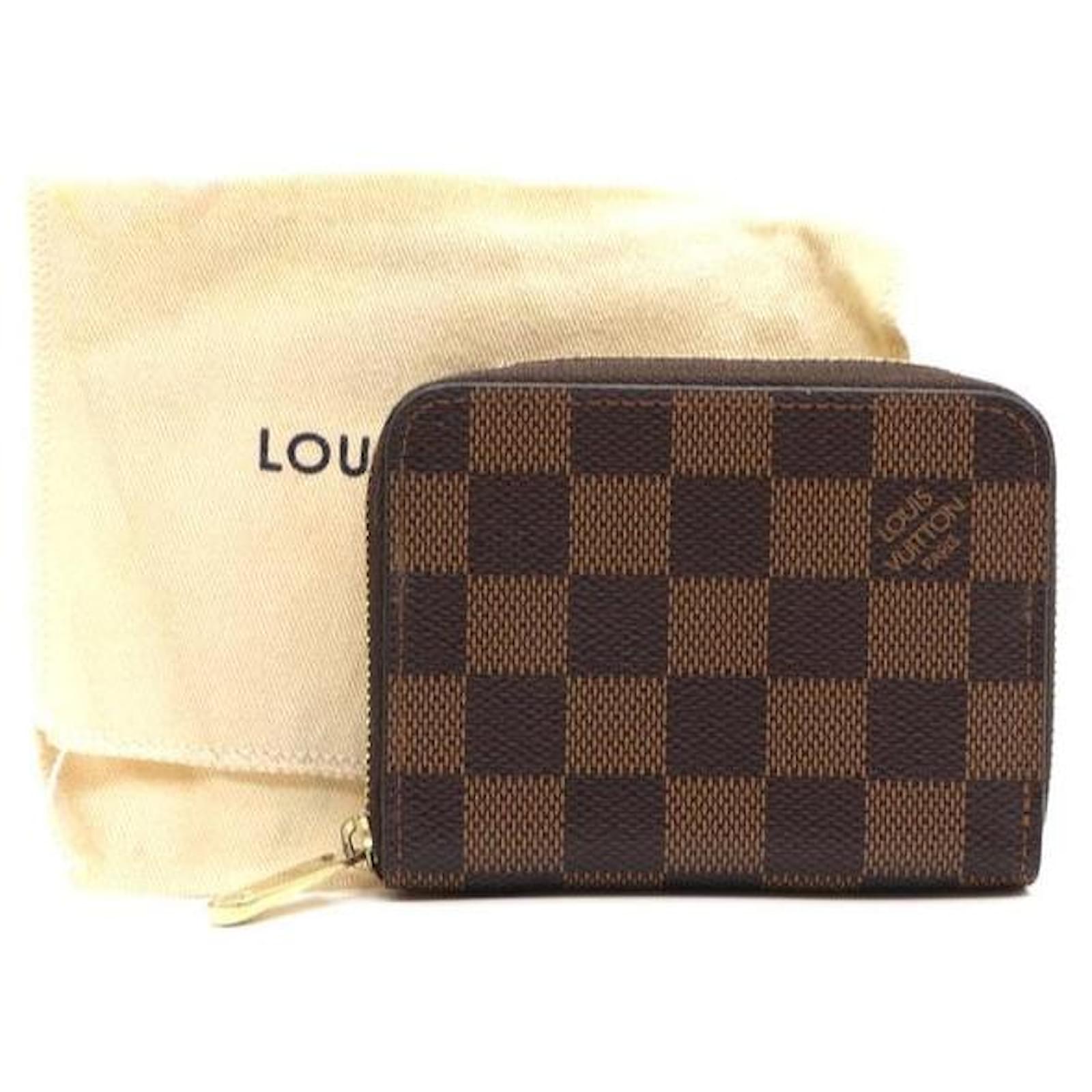 Porta carte in pelle Louis Vuitton LV pieghevole da uomo marrone damier  Ebene