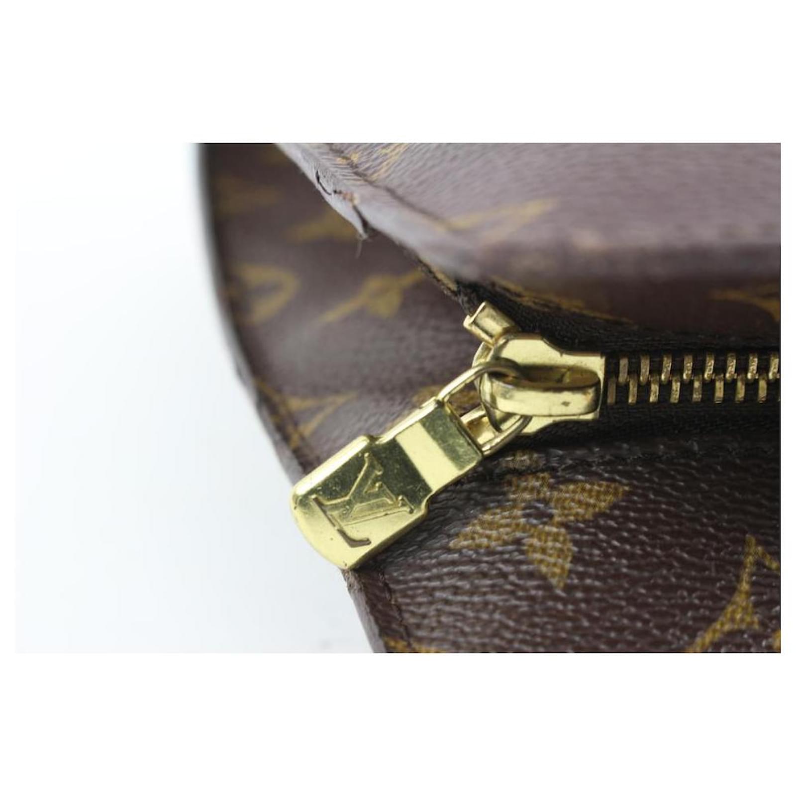 Louis Vuitton Sac cabas zippé Babylone Monogram Cuir ref.544100 - Joli  Closet