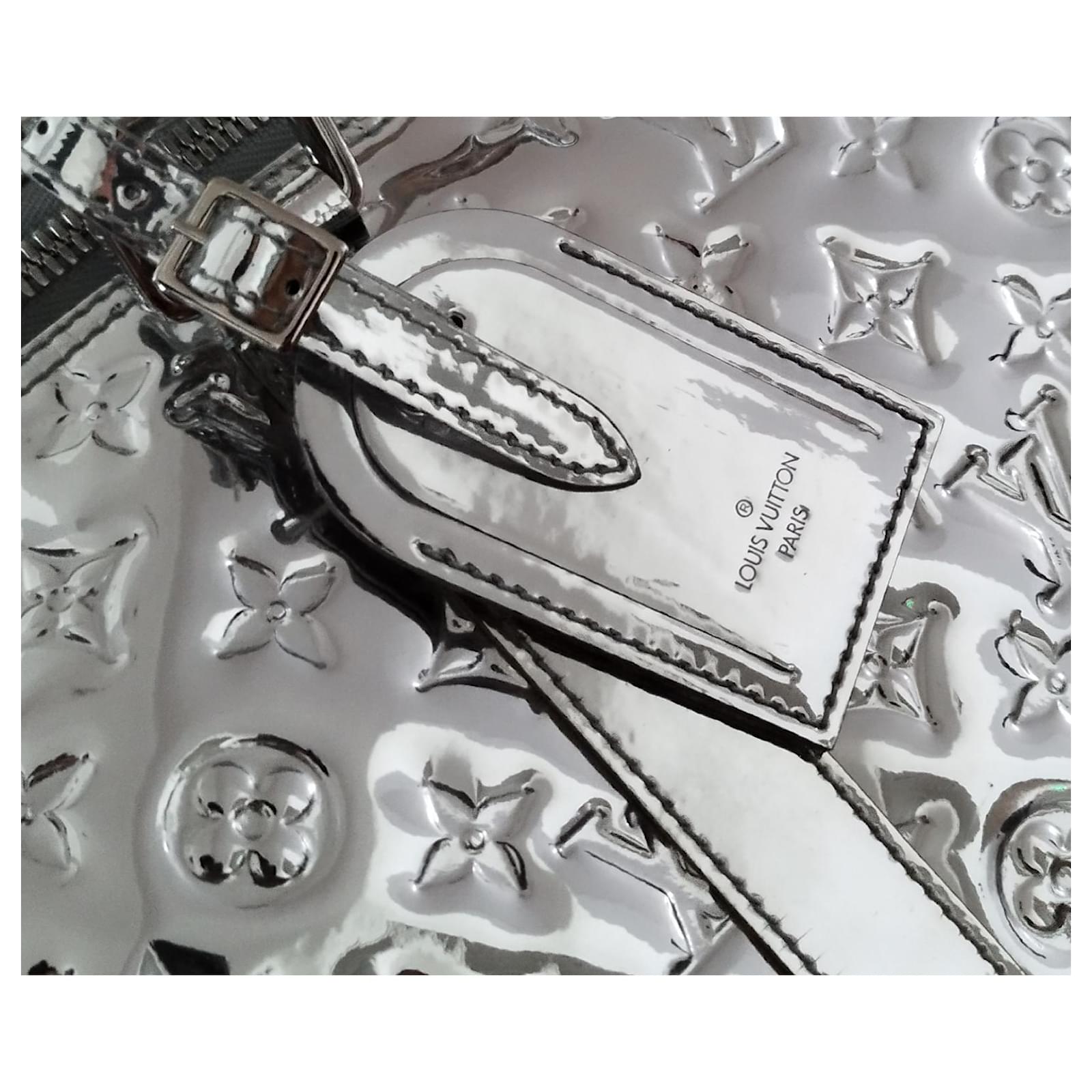 Louis Vuitton Keepall 50 Bandouliere Mirror Silver – Vault 55