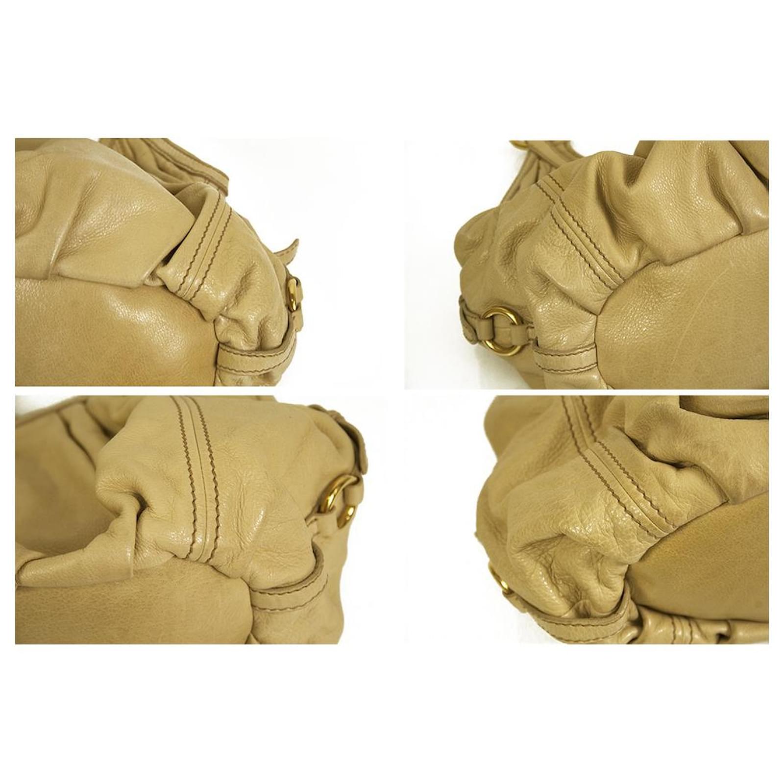 Miu Miu Matelassé Beige calf leather Wrinkled Leather Clutch Bag wrist  strap handbag ref.546620 - Joli Closet