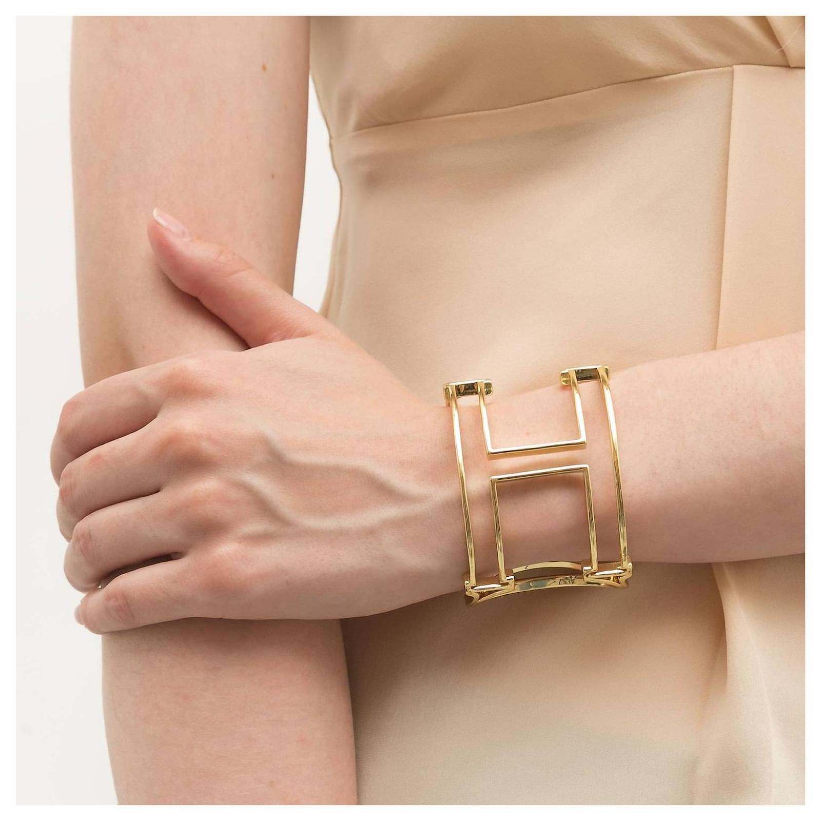 Elegant Carolina Herrera Gold Bracelet