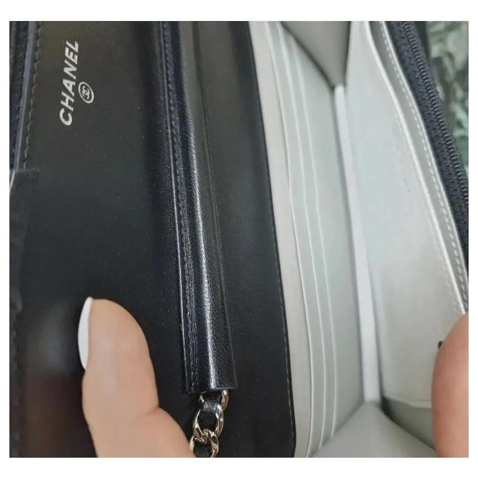 Chanel Lambskin Camellia Embossed Wallet On Chain WOC Black Leather  ref.566975 - Joli Closet