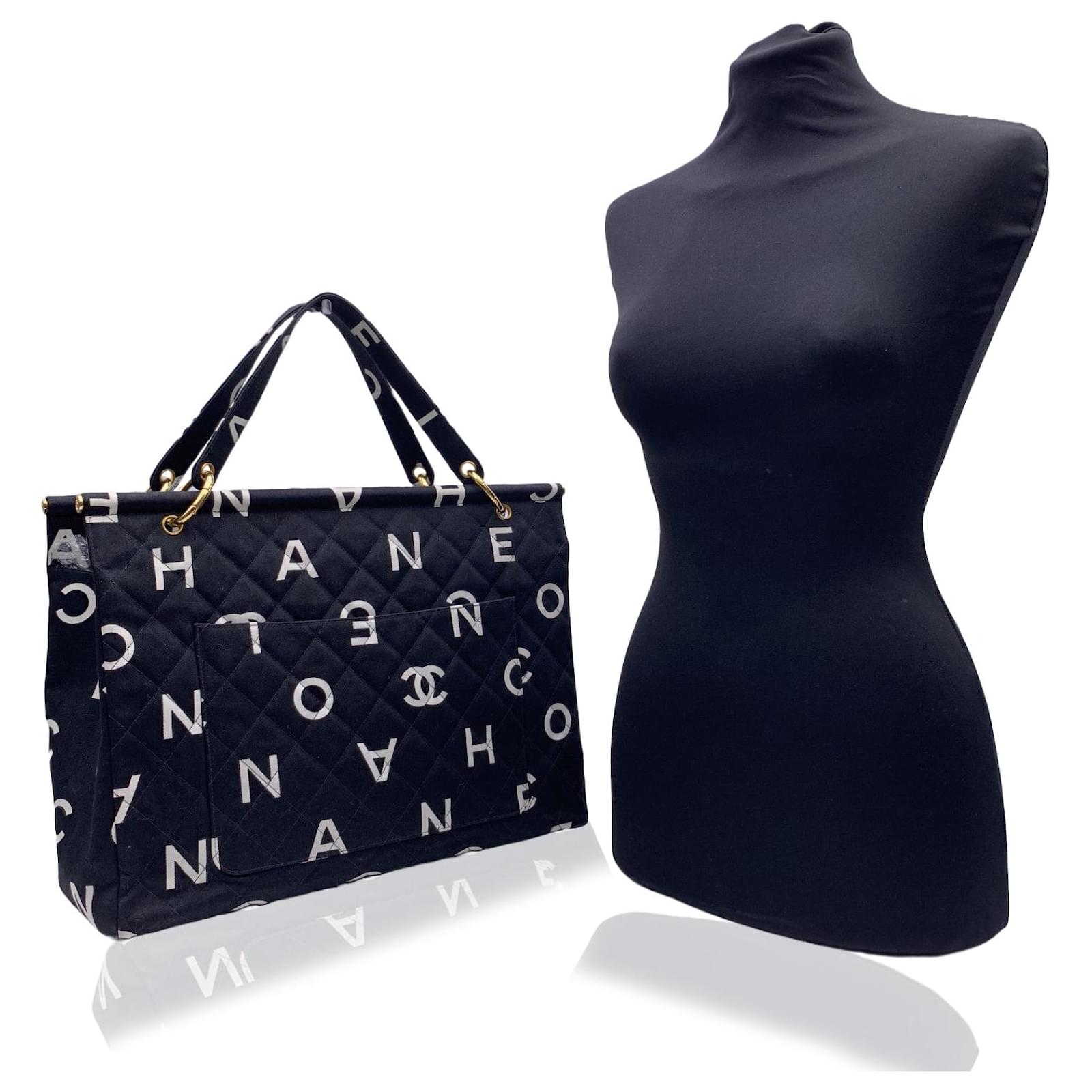 Chanel Vintage Black and White Quilted Canvas Logo Letters Tote Bag Cloth  ref.571814 - Joli Closet