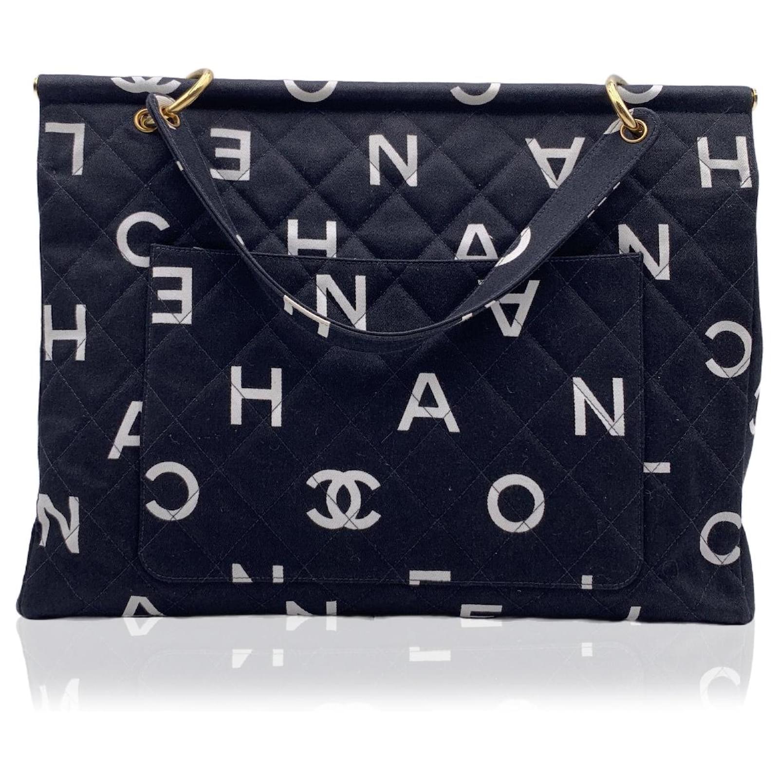 Chanel Vintage Black and White Quilted Canvas Logo Letters Tote Bag Cloth  ref.571814 - Joli Closet