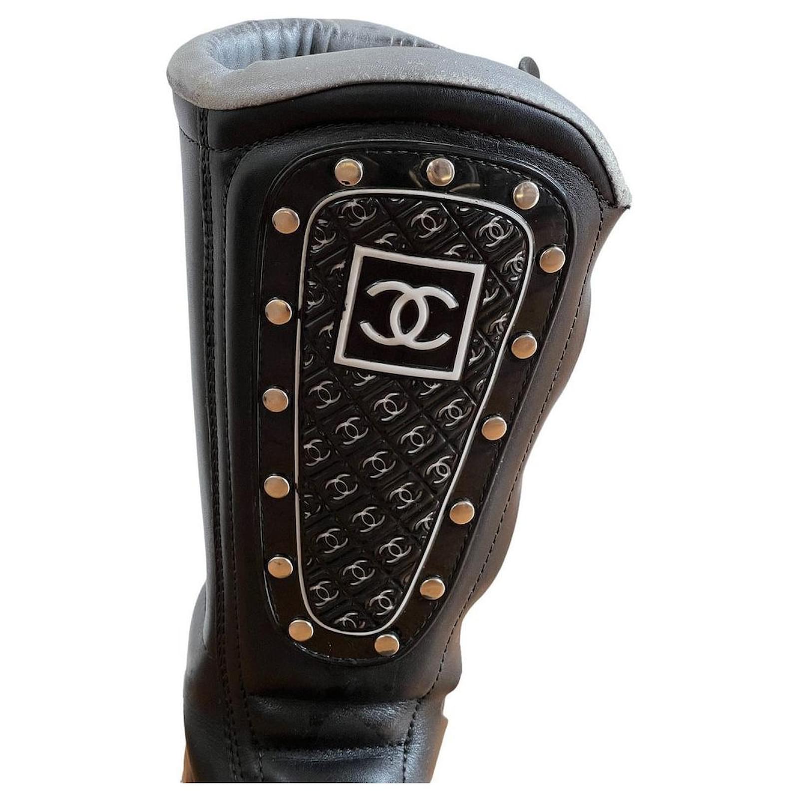 Chanel Biker Combat Boots, Rare Boots. Black White Silver hardware Leather  Metal ref.572226 - Joli Closet