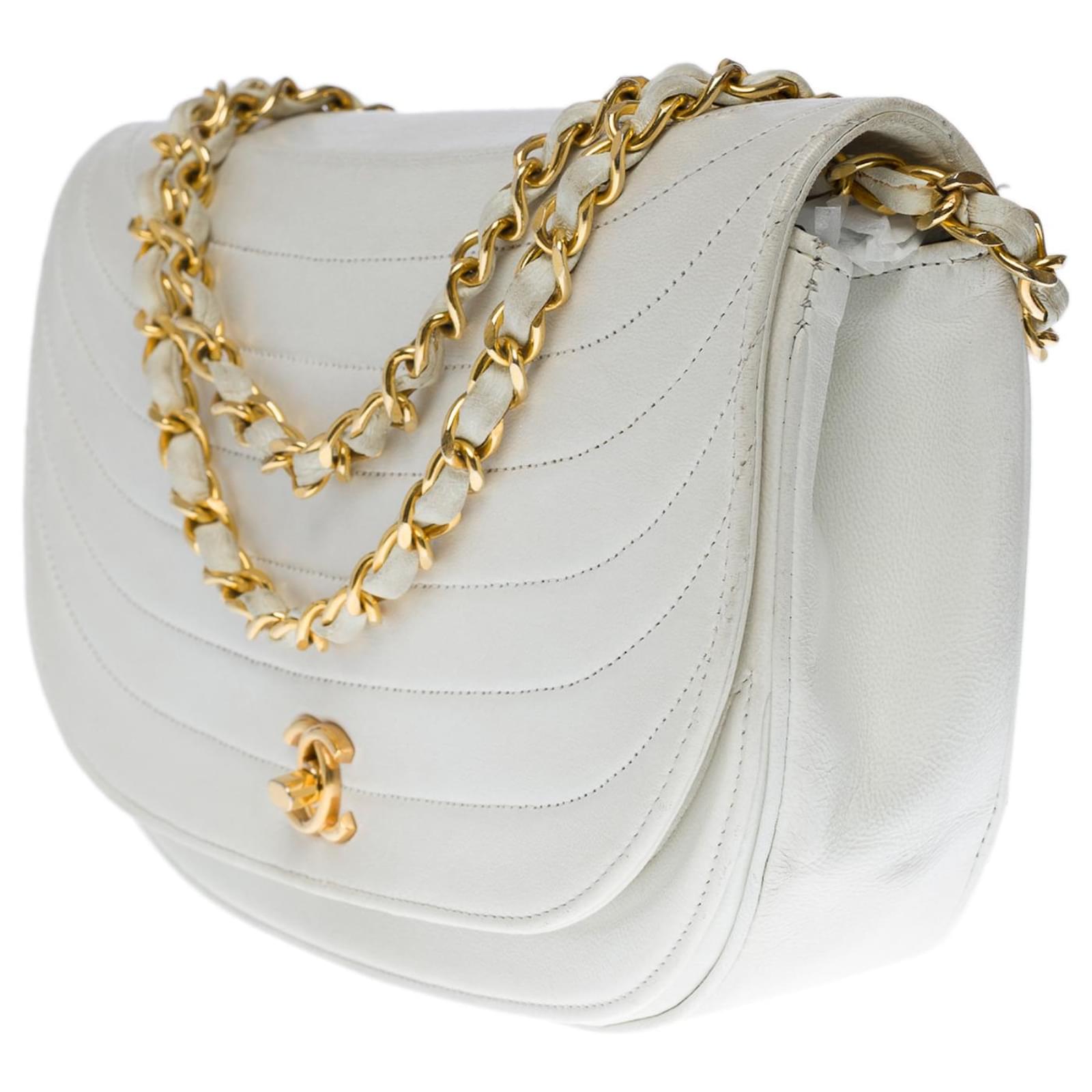 Timeless Very beautiful Chanel Classic half-moon flap bag handbag