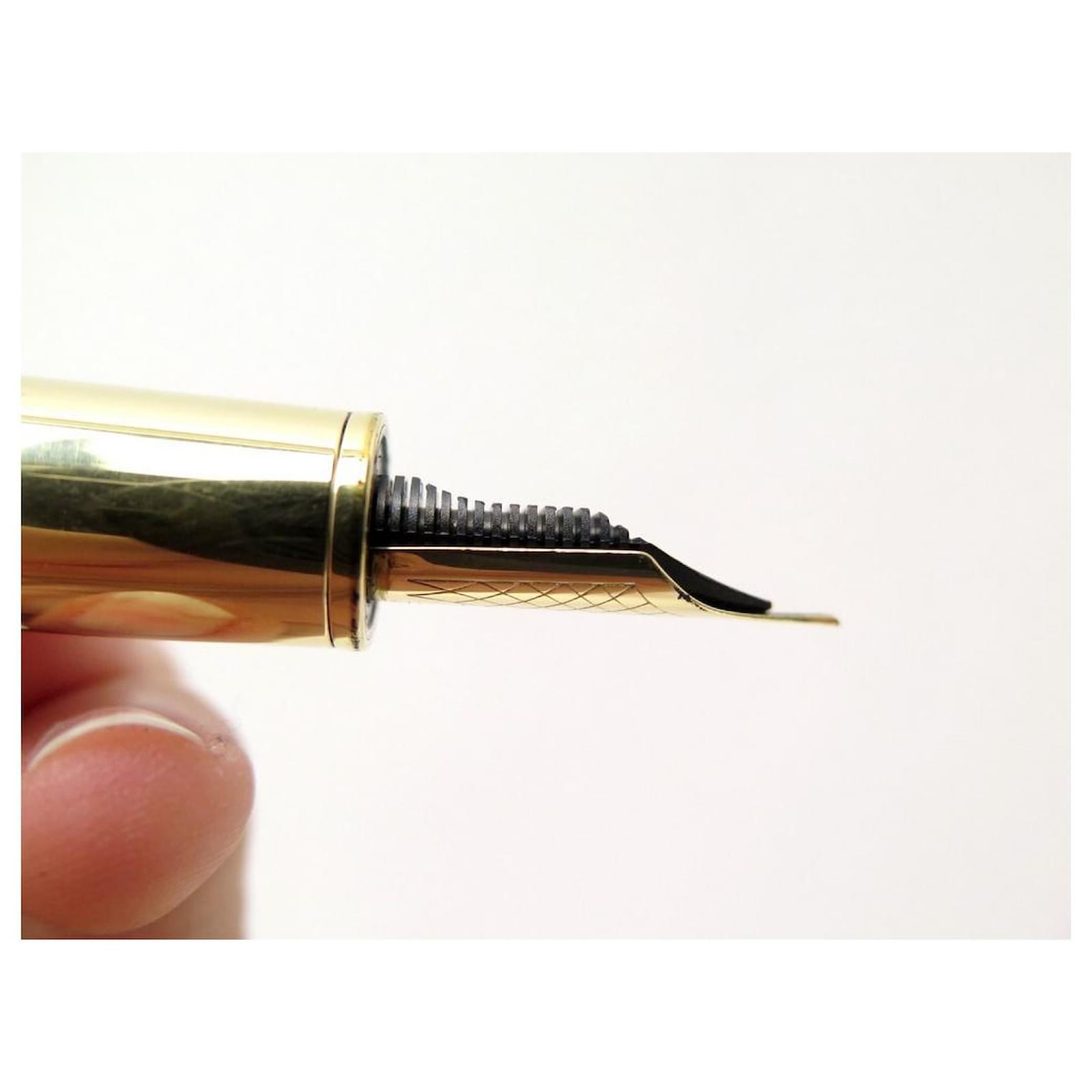 A Louis Vuitton Cargo Exotic brown leather fountain pen, gilt clip
