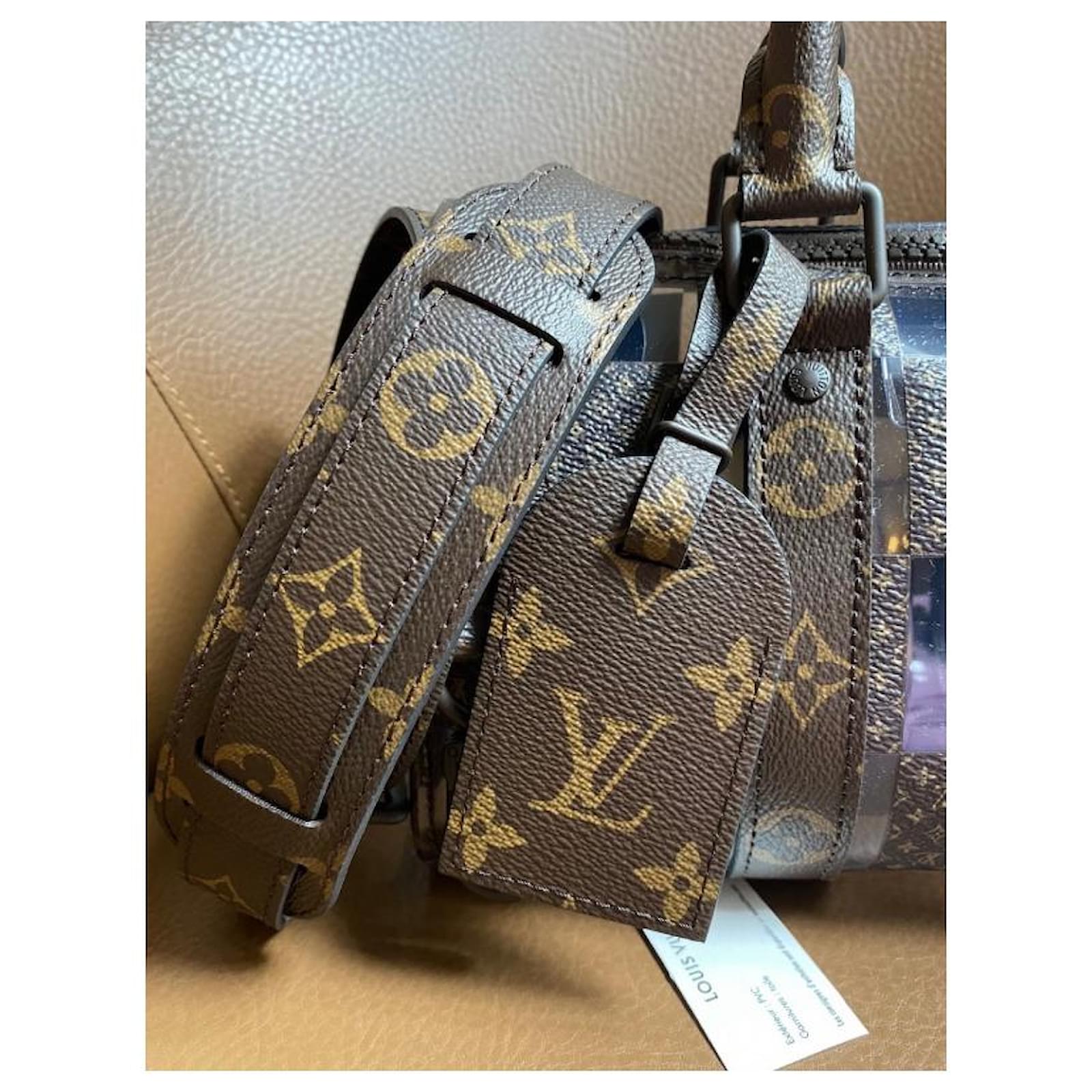Louis Vuitton VIRGIL ABLOH COLLECTION - CATWALK 2022-KEEPALL TRAVEL BAG 55  SHOULDER STRAP TRUNK THE EYE- 33350121251 Brown Leather Cloth ref.855331 -  Joli Closet