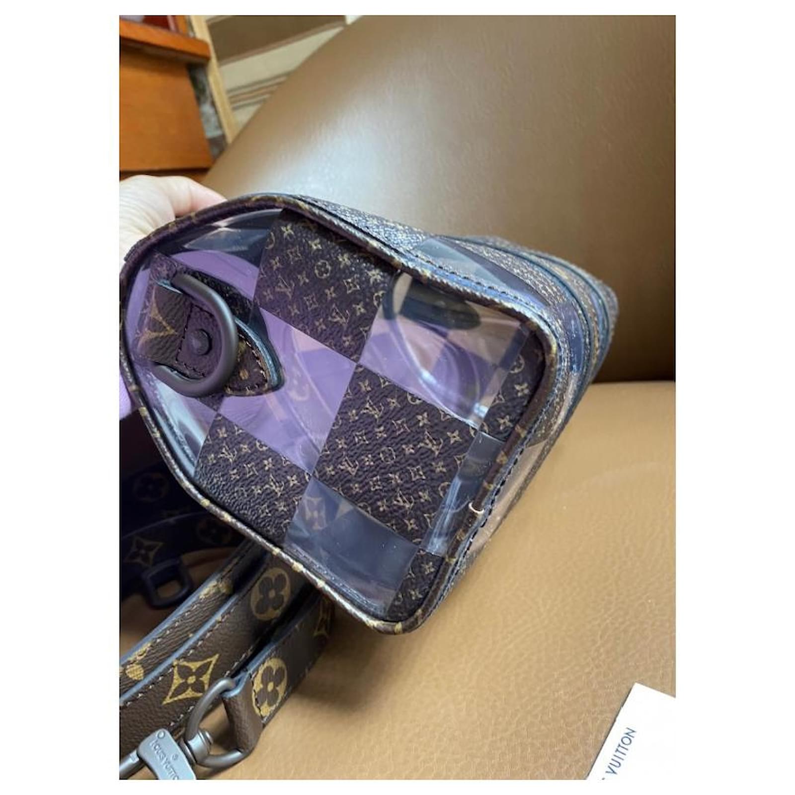 Keepall travel bag Louis Vuitton Brown in Plastic - 31348077