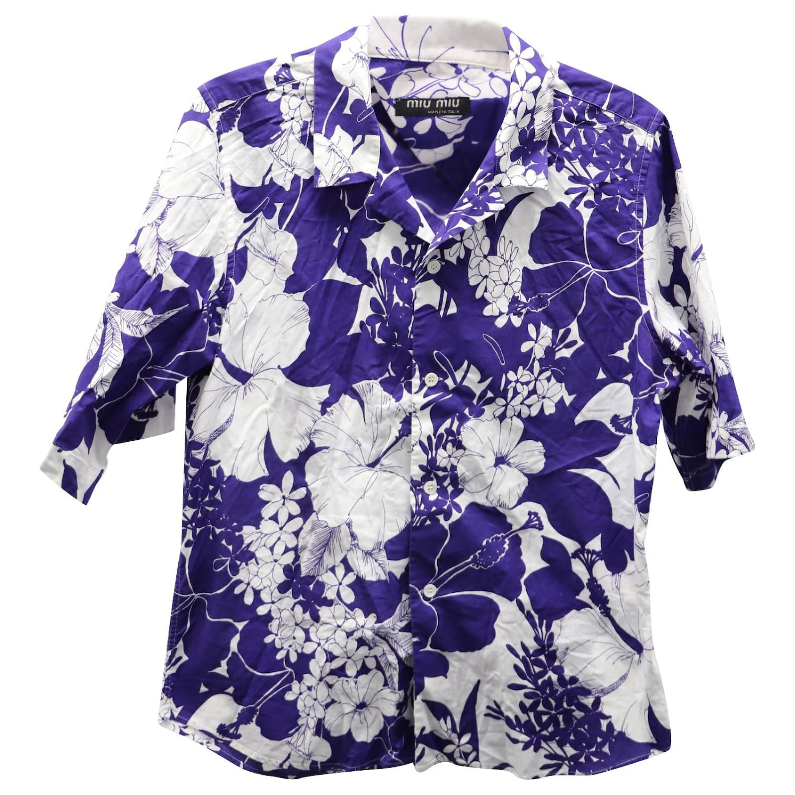 Polo en coton blanc avec imprimé floral, coupe droite et manches courtes