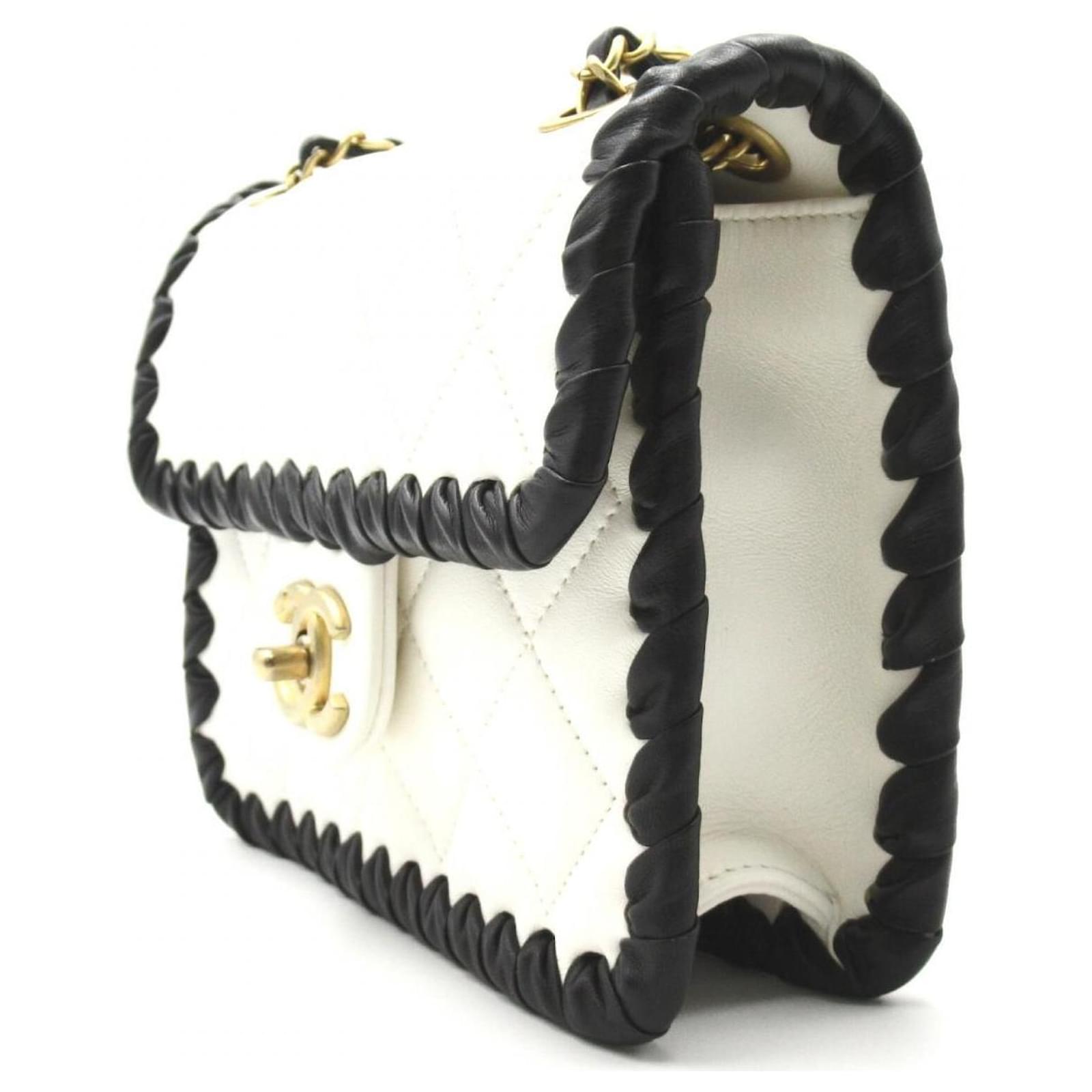 Chanel Matelasse Black Trim Evening Flap Bag White Leather Pony-style  calfskin ref.596990 - Joli Closet